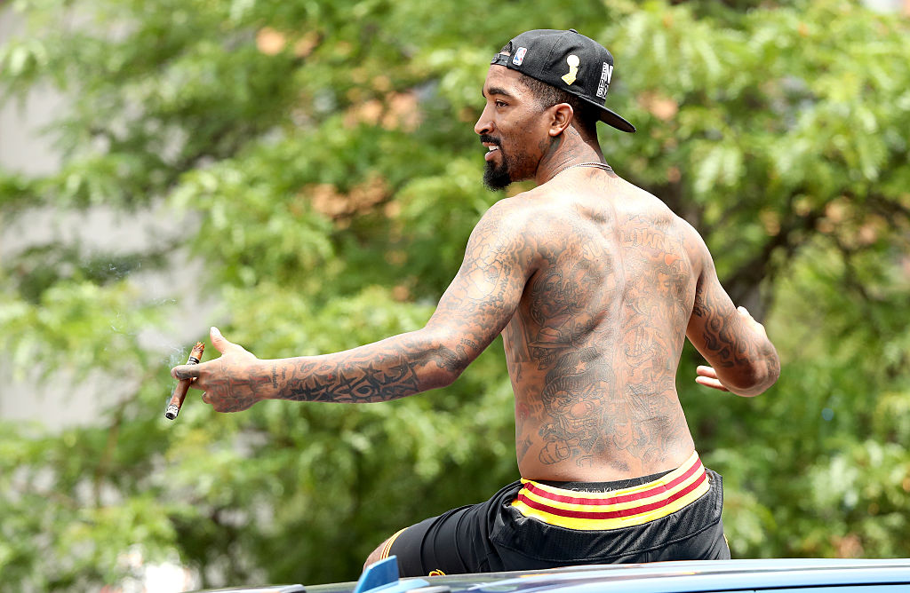 J.R. Smith acknowledges the crowd during the Cavaliers' 2016 NBA Championship victory parade and rally. (Mike Lawrie/Getty Images)