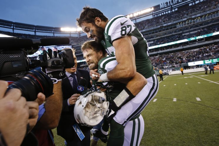 Ryan FItzpatrick and Eric Decker celebrate after an overtime win over the Patriots last season (AP)