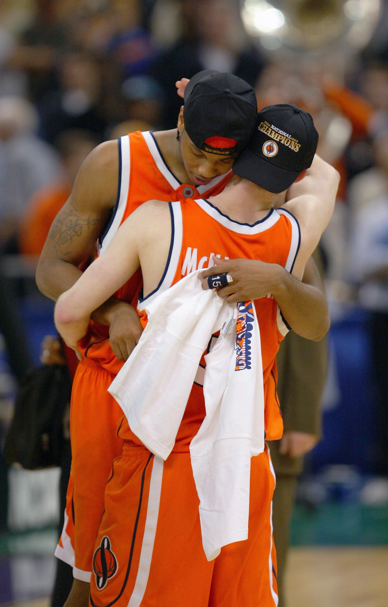 Carmelo Anthony of Syracuse hugs teammate Gerry McNamara after winning the 2003 NCAA championship. (Craig Jones/Getty Images)