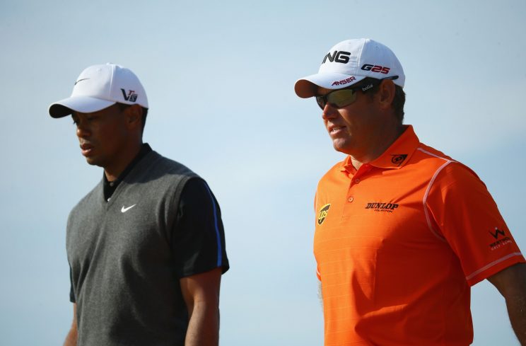 Tiger Woods and Lee Westwood will be on opposite sides at the Ryder Cup. (Getty Images)