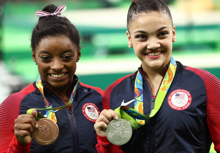 Simone Biles (left) and Laurie Hernandez earned bronze and silver in balance beam, respectively (Getty)