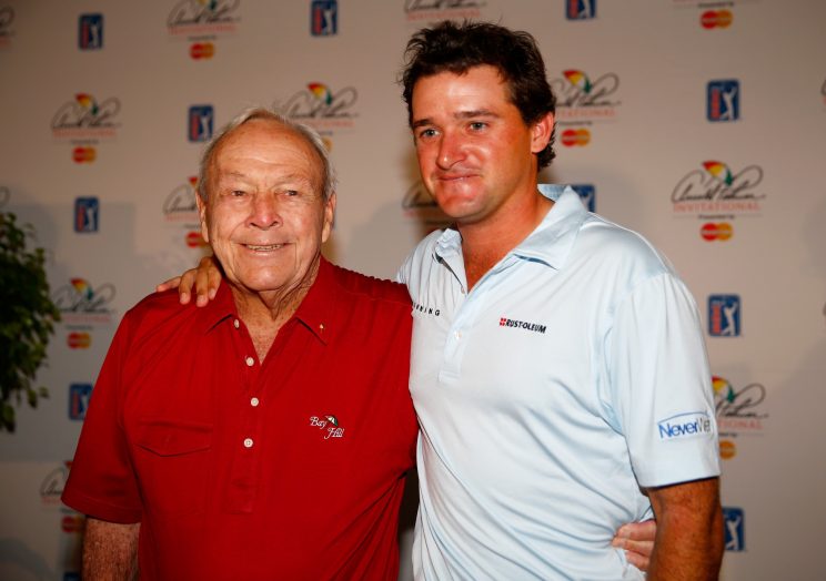 Arnold Palmer and his grandson Sam Saunders. (Getty Images)