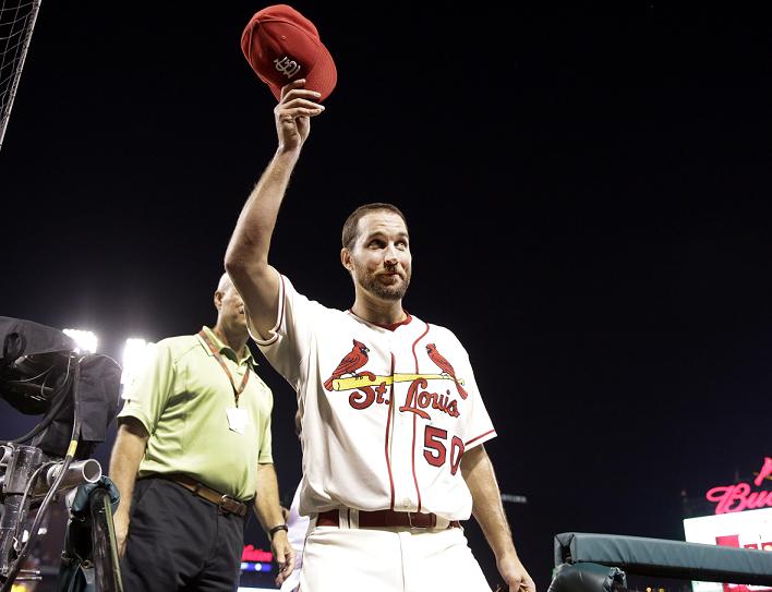 Adam Wainwright acknowledge the crowed after completing his 10th career shutout. (AP)