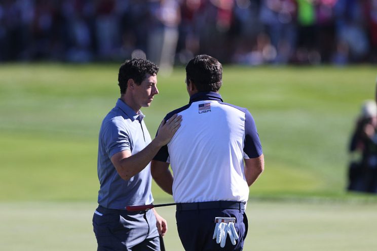 Ryder Cup 2016. Day Three. Rory McIlroy of Europe congratulates Patrick Reed of the United States on his win during the Sunday singles competition at the Ryder Cup tournament at Hazeltine National Golf Club on October 02, 2016 in Chaska, Minnesota. (Photo by Tim Clayton/Corbis via Getty Images)