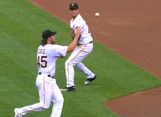 Gerrit Cole makes a barehand grab of David Freese's perfect behind-the-back flip to get the out. (MLB screen grab)