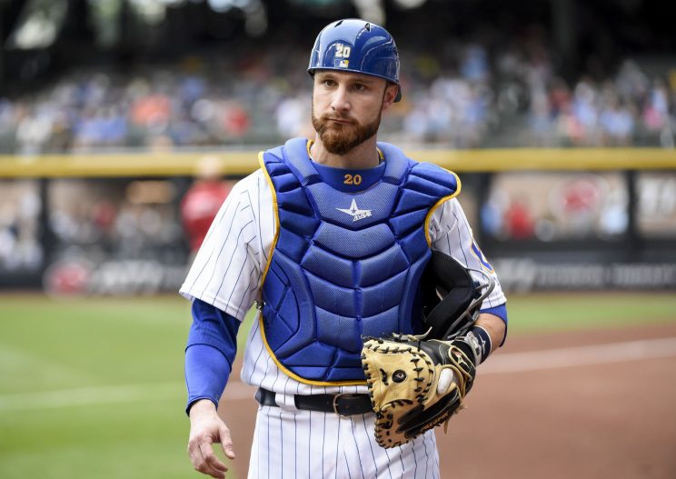 Jonathan Lucroy remains in Milwaukee for now after vetoing trade to Cleveland. (AP)