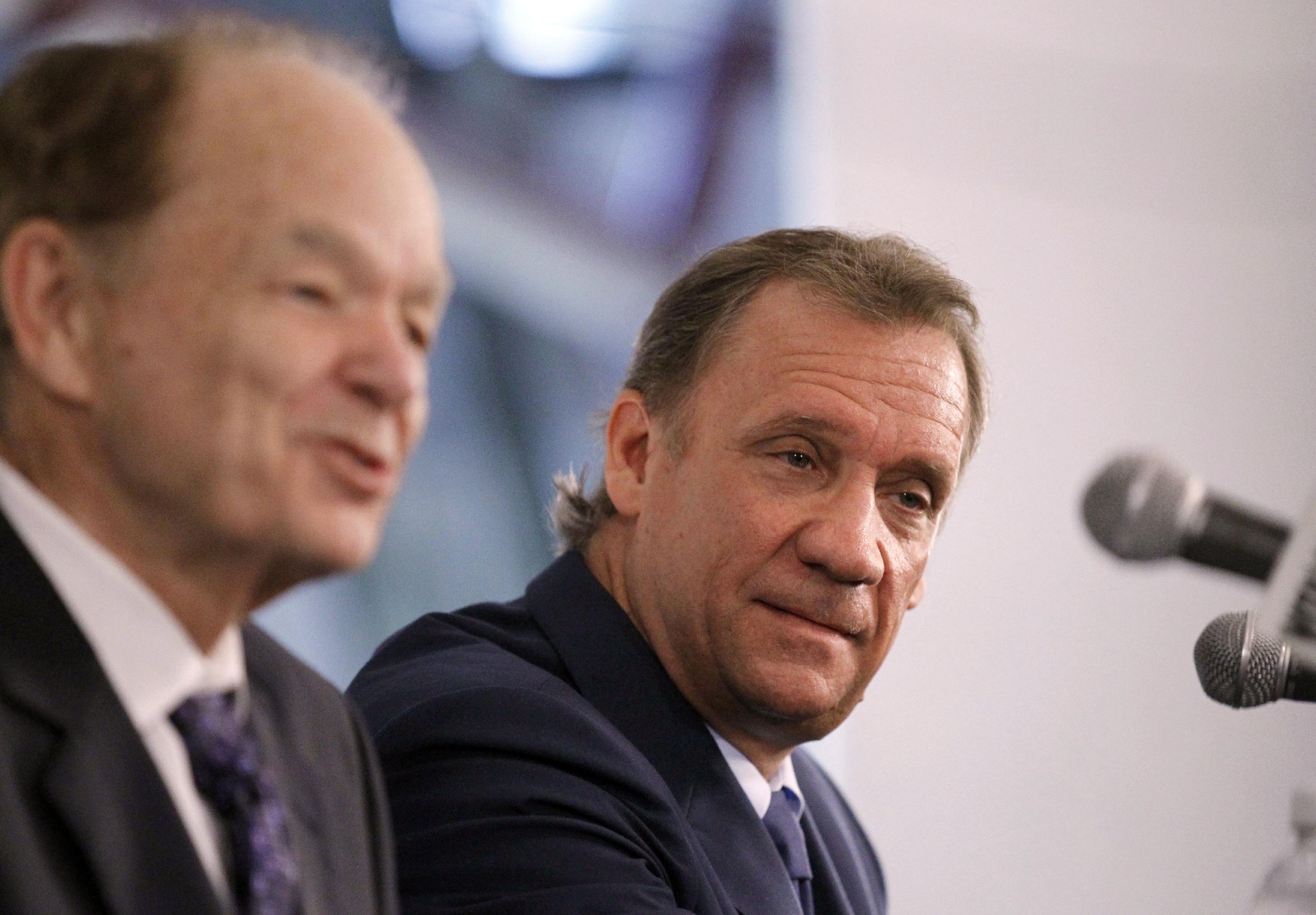 Glen Taylor (left) thinks Flip Saunders will stay on the bench next year, but maybe not beyond. (AP/Ann Heisenfelt)