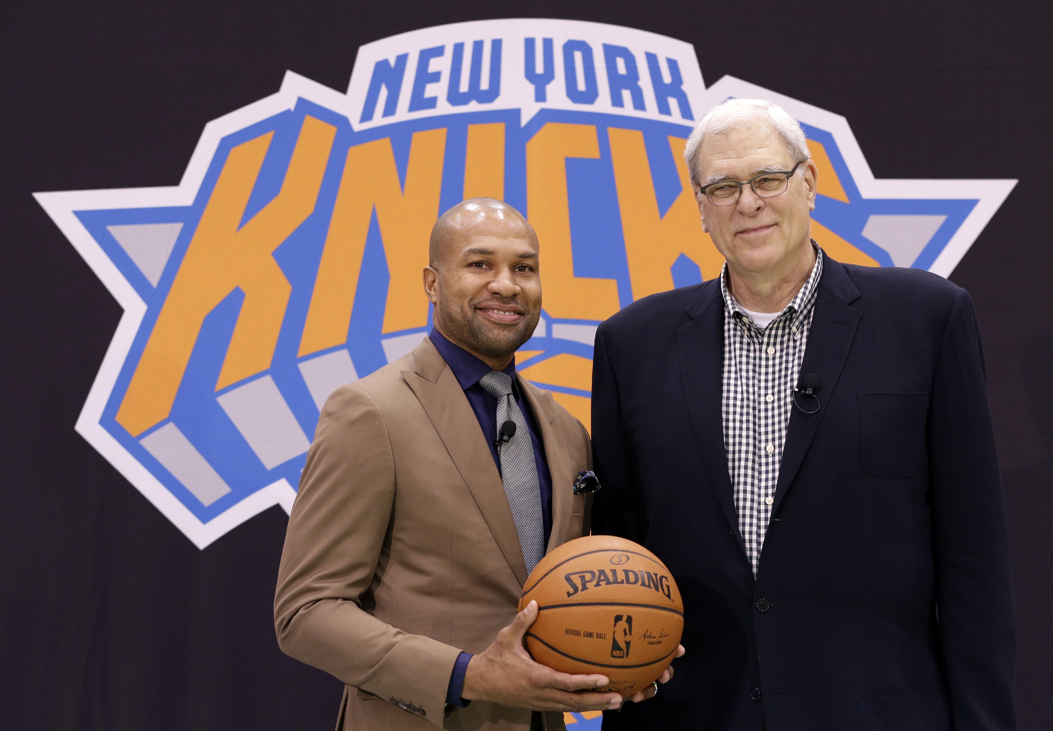 The new coach, and his coach, tasked with getting the Garden rocking again. (AP/Seth Wenig)