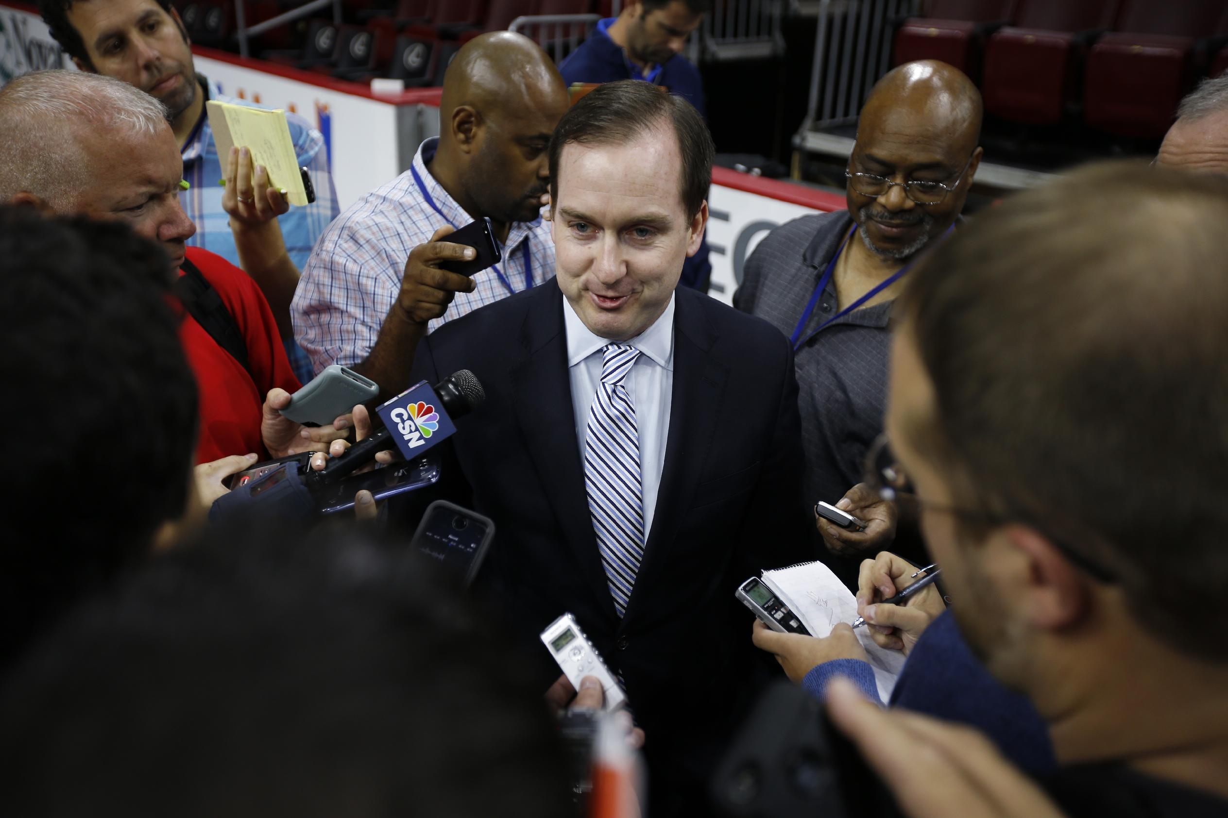 Sam Hinkie faces questions. (AP/Matt Slocum)