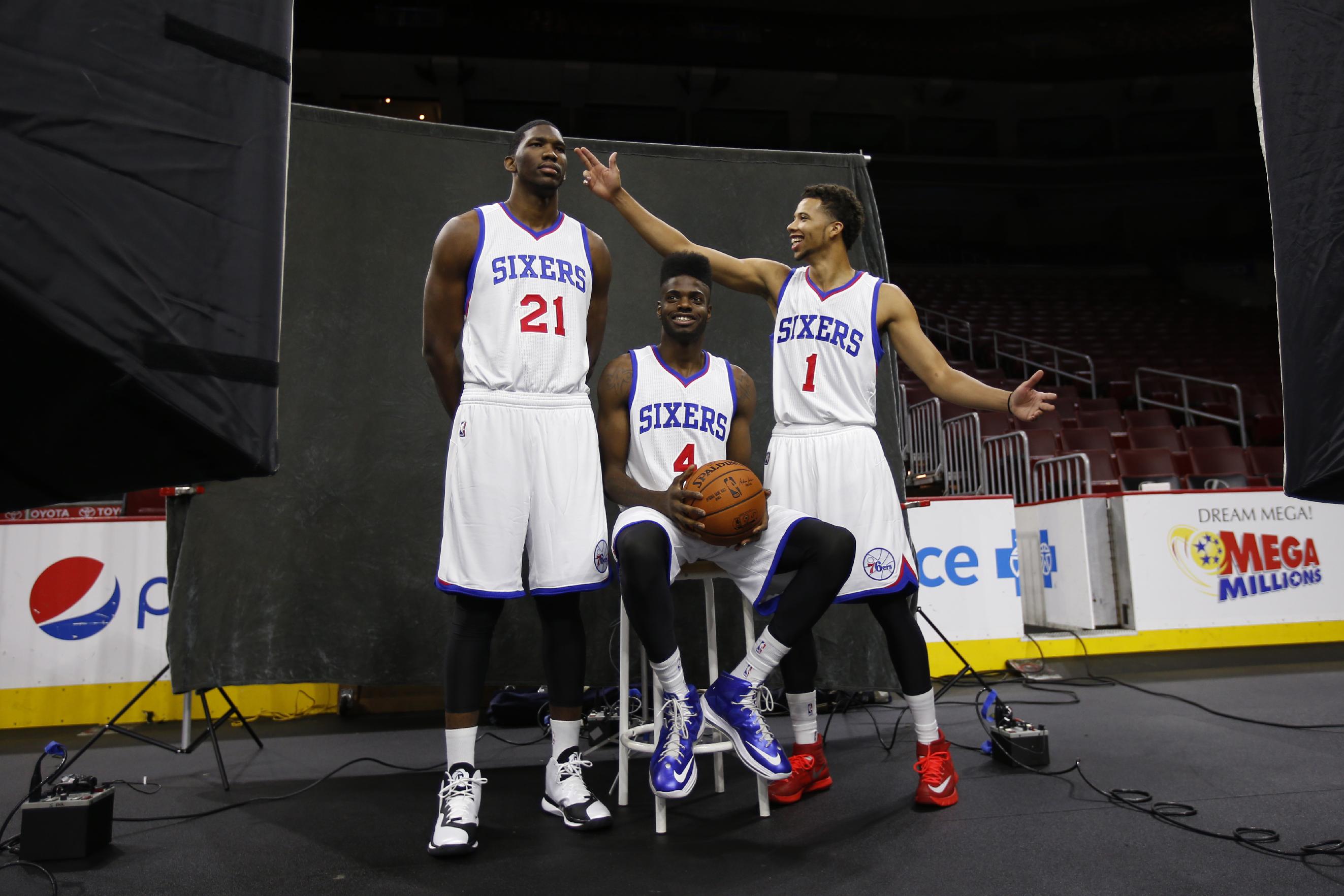 Of Sam Hinkie's top three draft picks, only Nerlens Noel (center) remains a contributor in Philly. (AP)