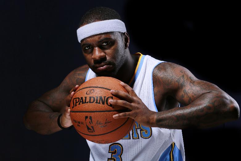 Denver Nuggets Ty Lawson poses for a portrait during NBA basketball media day, Monday, Sept. 29, 2014, in Denver. (AP Photo/Jack Dempsey)