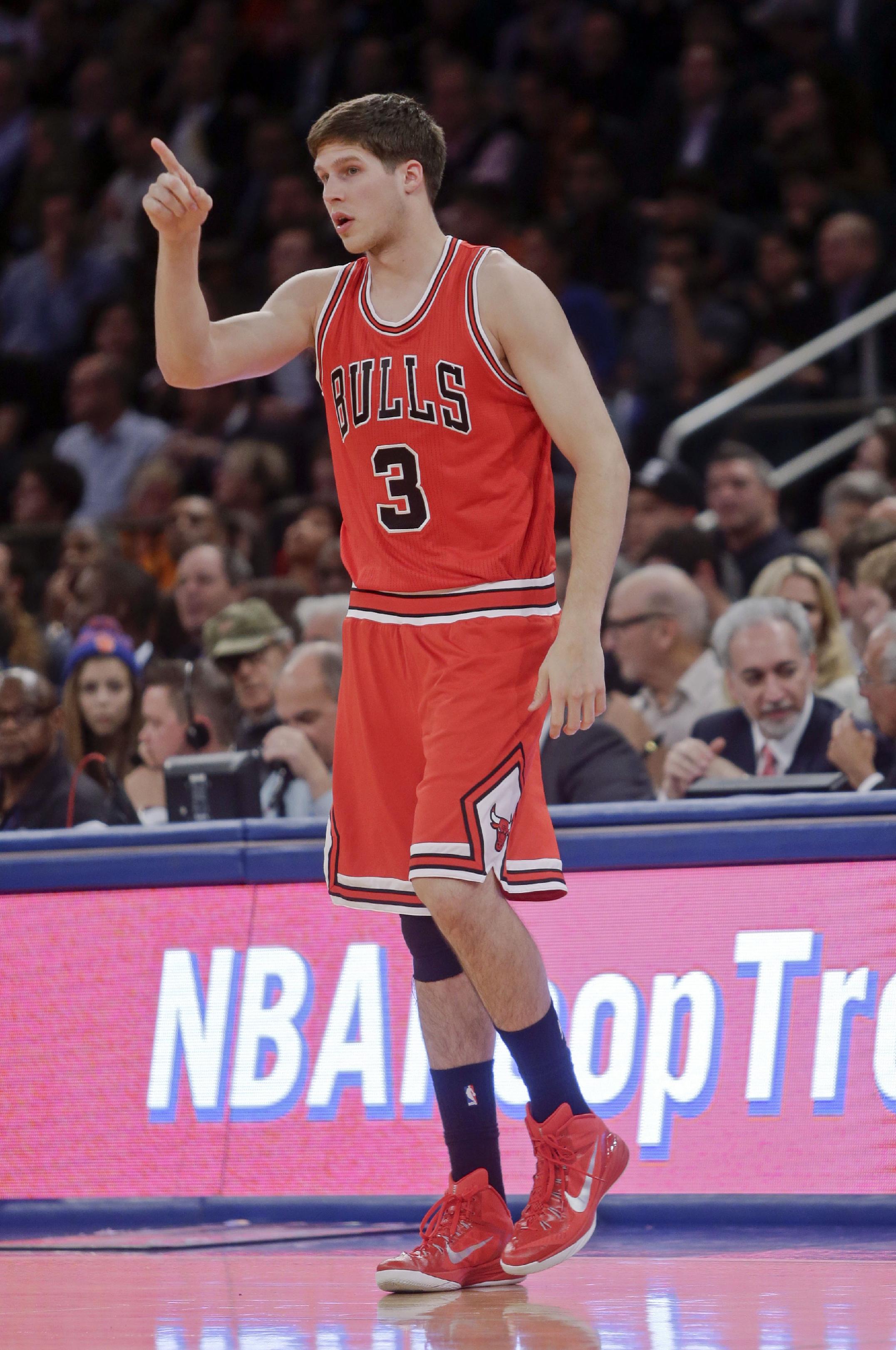 Chicago Bulls' Doug McDermott gestures to a teammate during the first half of an NBA basketball game against the New York Knicks, Wednesday, Oct. 29, 2014, in New York. (AP Photo/Frank Franklin II)