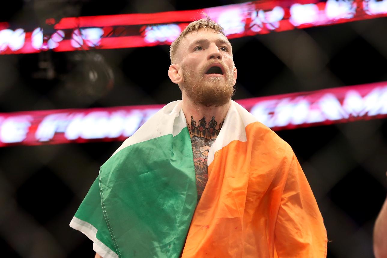 Conor McGregor, of Ireland, celebrates a win against Dennis Siver, of Germany, after their featherweight fight at UFC Fight Night, Sunday, Jan. 18, 2015 in Boston.  McGregor won via 2nd round TKO. (AP Photo/Gregory Payan)