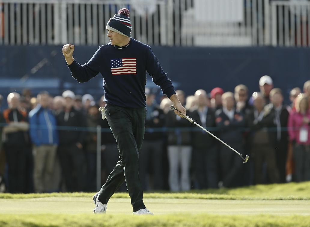 Jordan Spieth of the US celebrates putting out to win the 10th hole during the fourball match on the second day of the Ryder Cup golf tournament at Gleneagles, Scotland, Saturday, Sept. 27, 2014. (AP Photo/Alastair Grant)