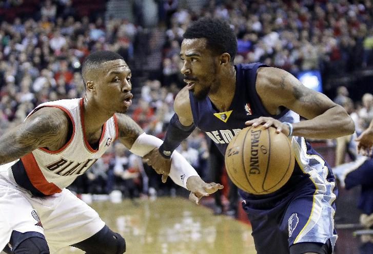 Mike Conley and Damian Lillard could prove to be a great point guard matchup. (AP/Don Ryan)