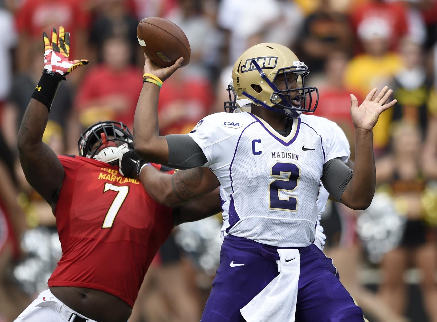 James Madison QB Vad Lee (2) is pressured by Maryland's Yannick Ngakoue (7) in 2014 (AP Photo/Nick Wass)