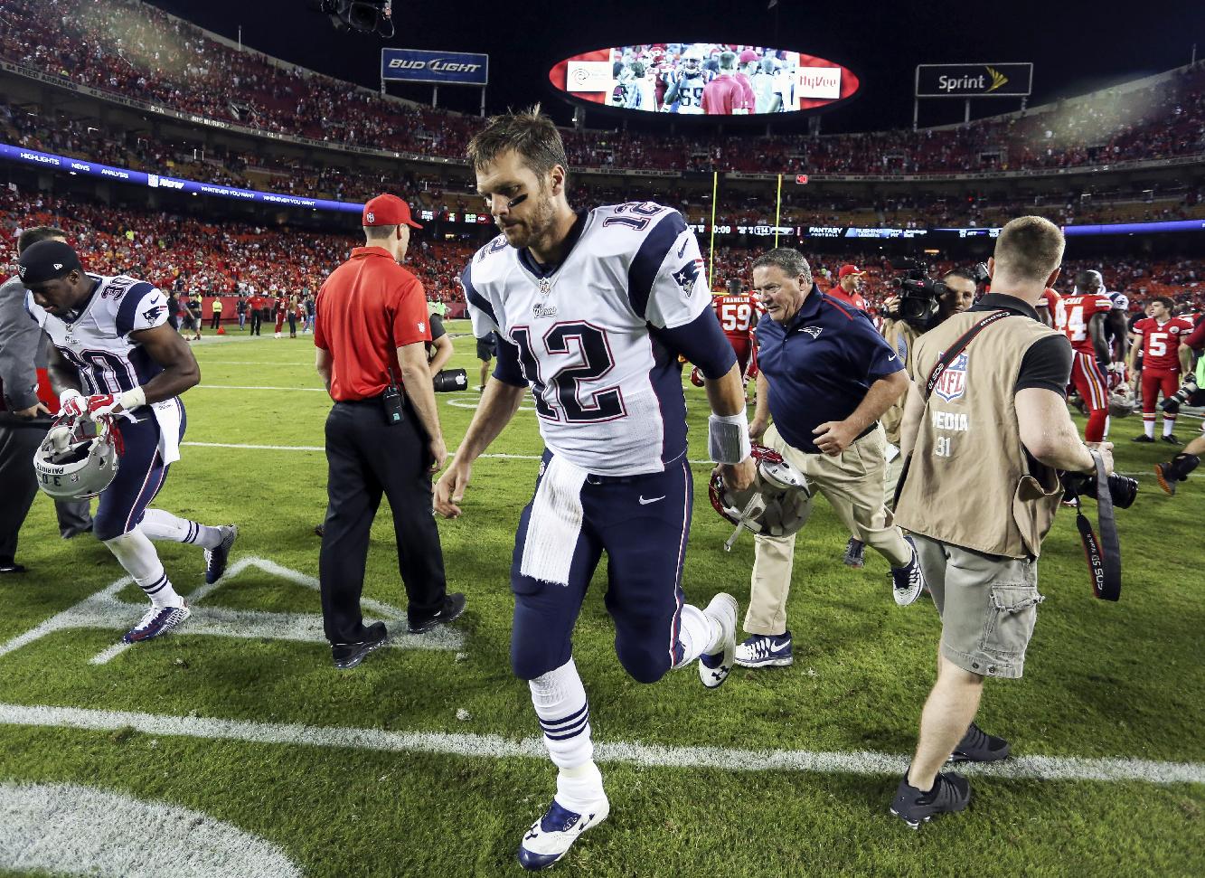 New England Patriots quarterback Tom Brady jogs off the field following a 41-14 loss to the Kansas City Chiefs in an NFL football game Monday, Sept. 29, 2014, in Kansas City, Mo. (AP Photo/Ed Zurga)