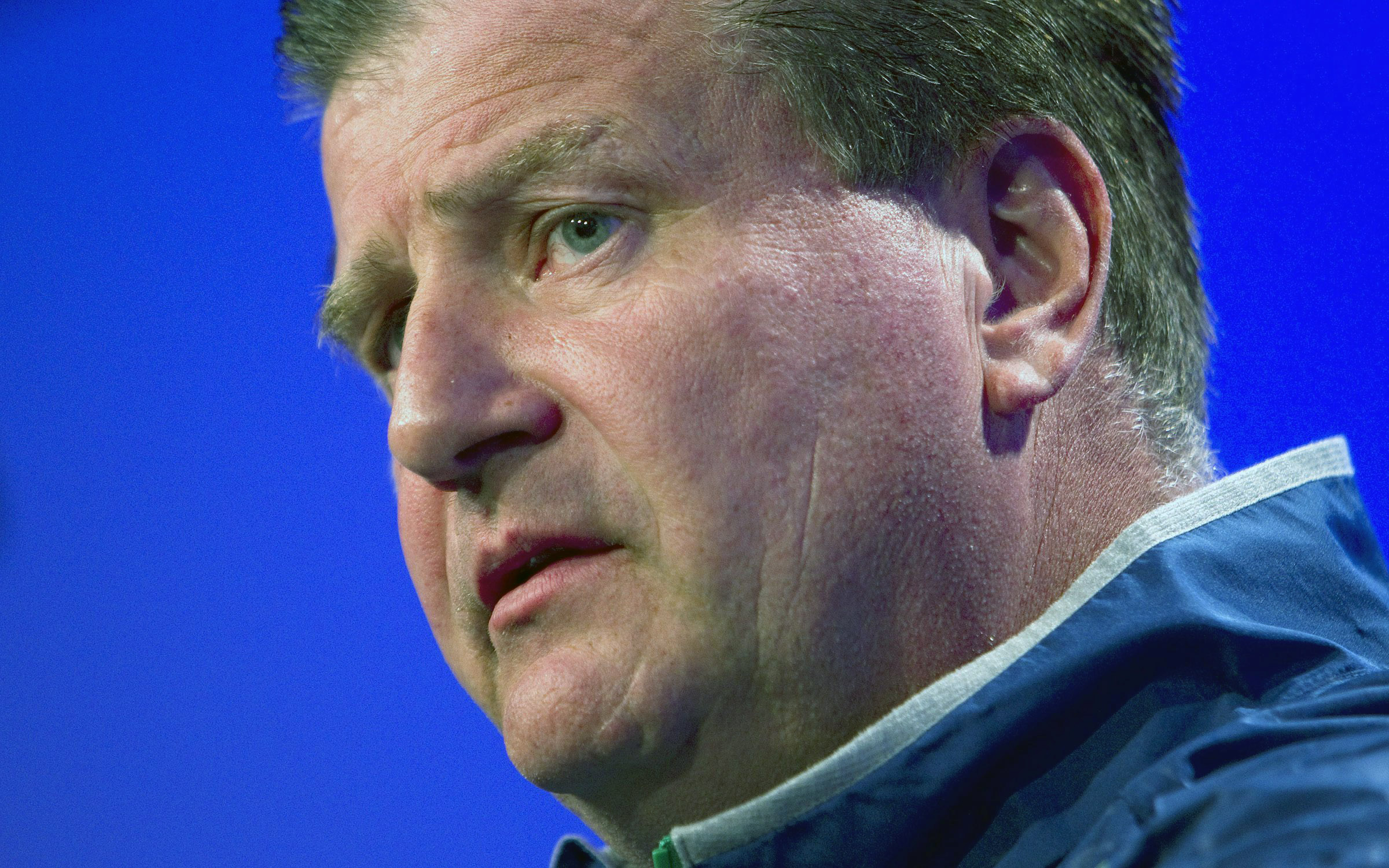 Vancouver Canucks general manager Jim Benning talks to media during the first day of NHL training camp, Thursday, Sept. 18, 2014 in Vancouver, British Columbia. (AP Photo/The Canadian Press, Ben Nelms)