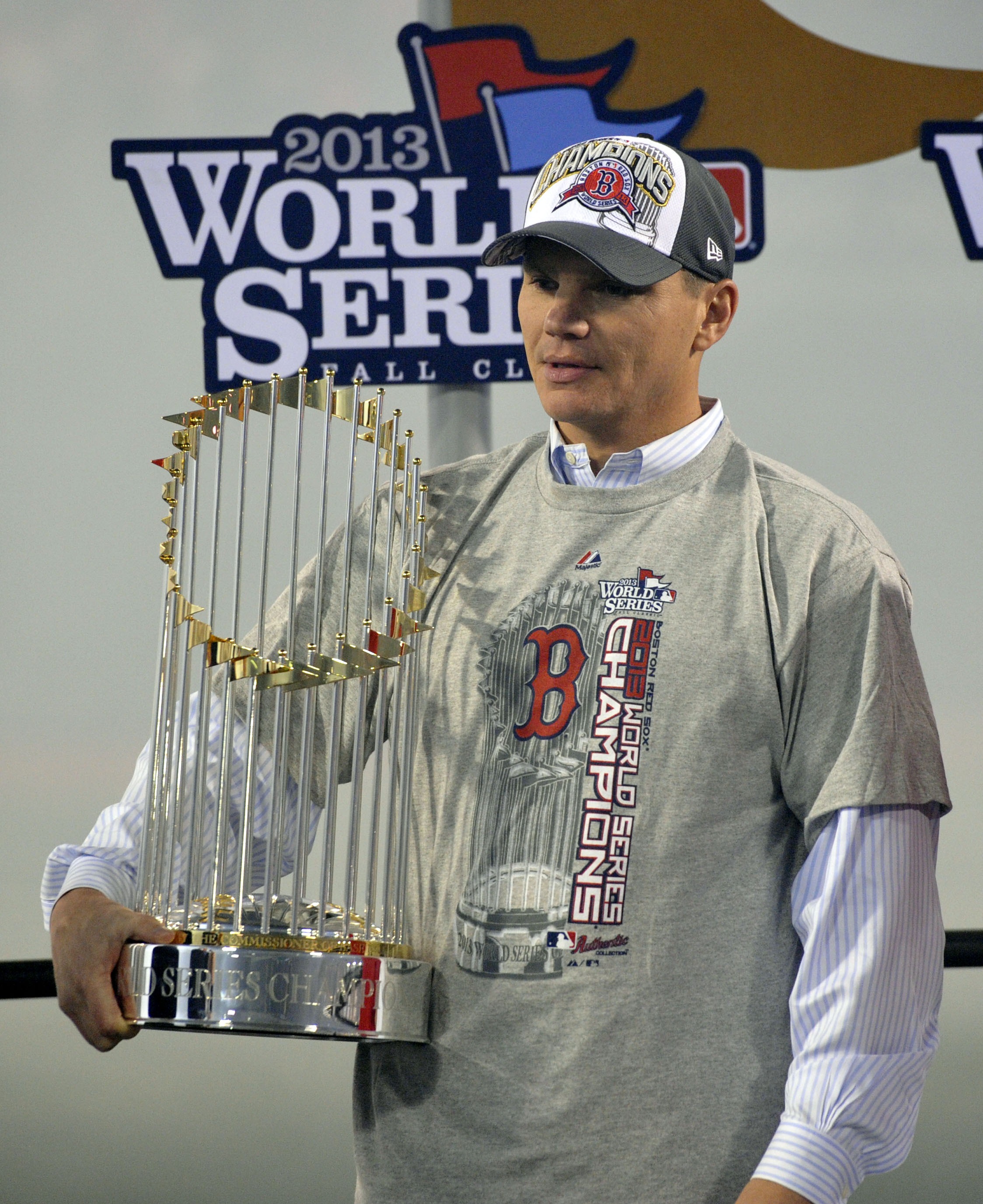 Red Sox general manager Ben Cherington holds the World Series championship trophy. (USA TODAY Sports)