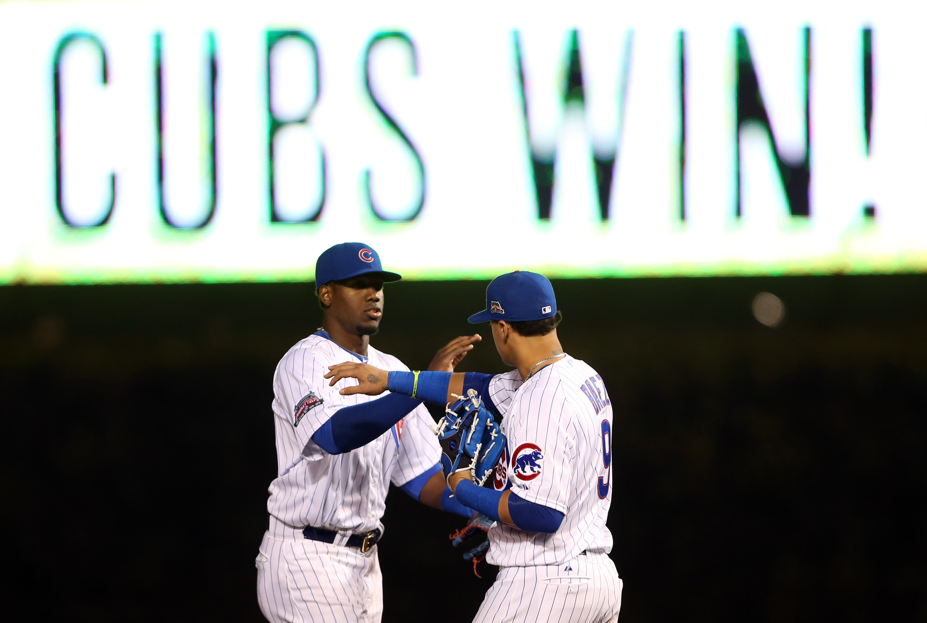 Jorge Soler (left) and Javier Baez celebrate a Cubs win. (USA TODAY Sports)