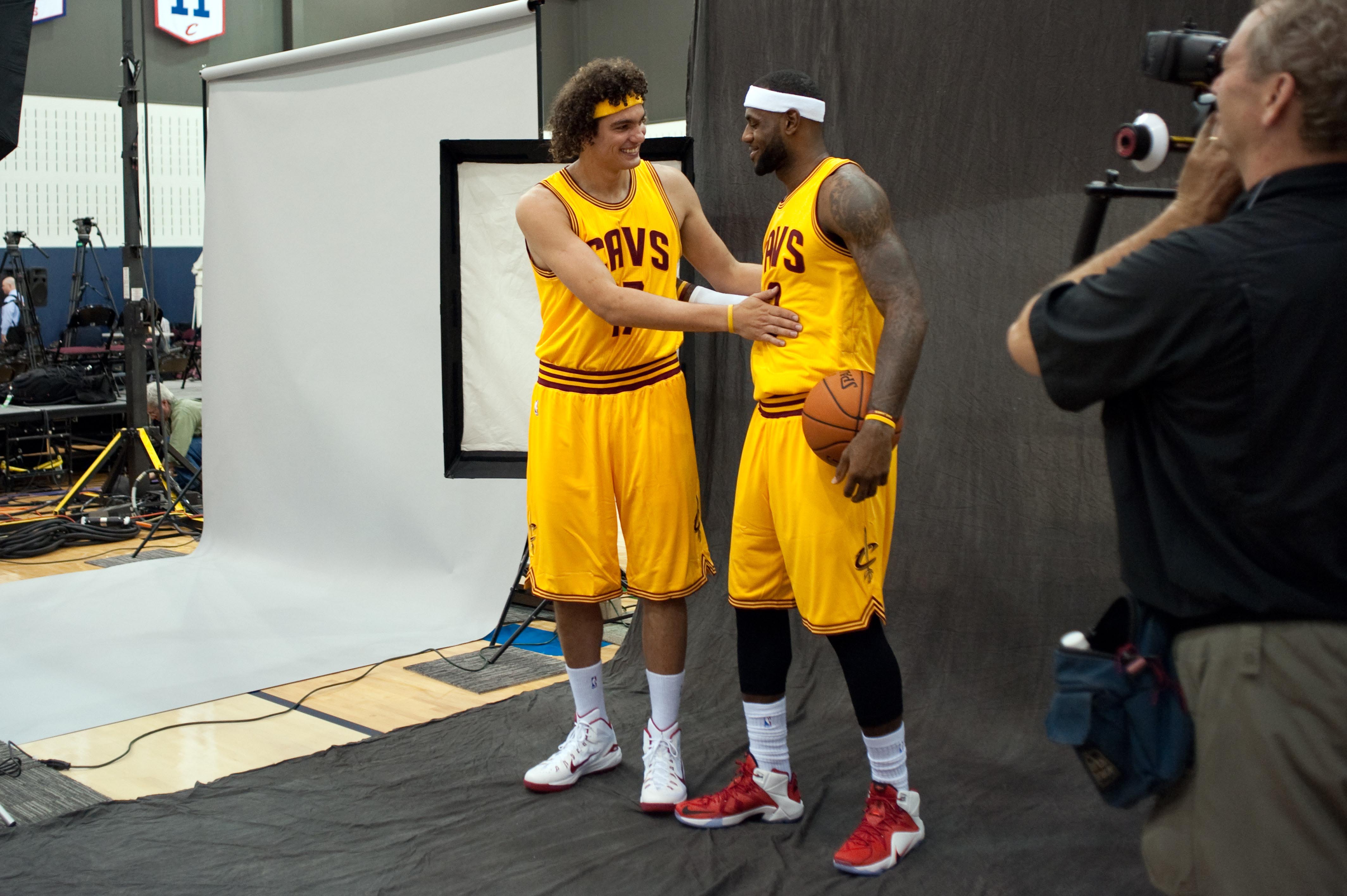 Anderson Varejao greets old pal LeBron James during Cleveland's media day. (Ken Blaze-USA TODAY Sports)