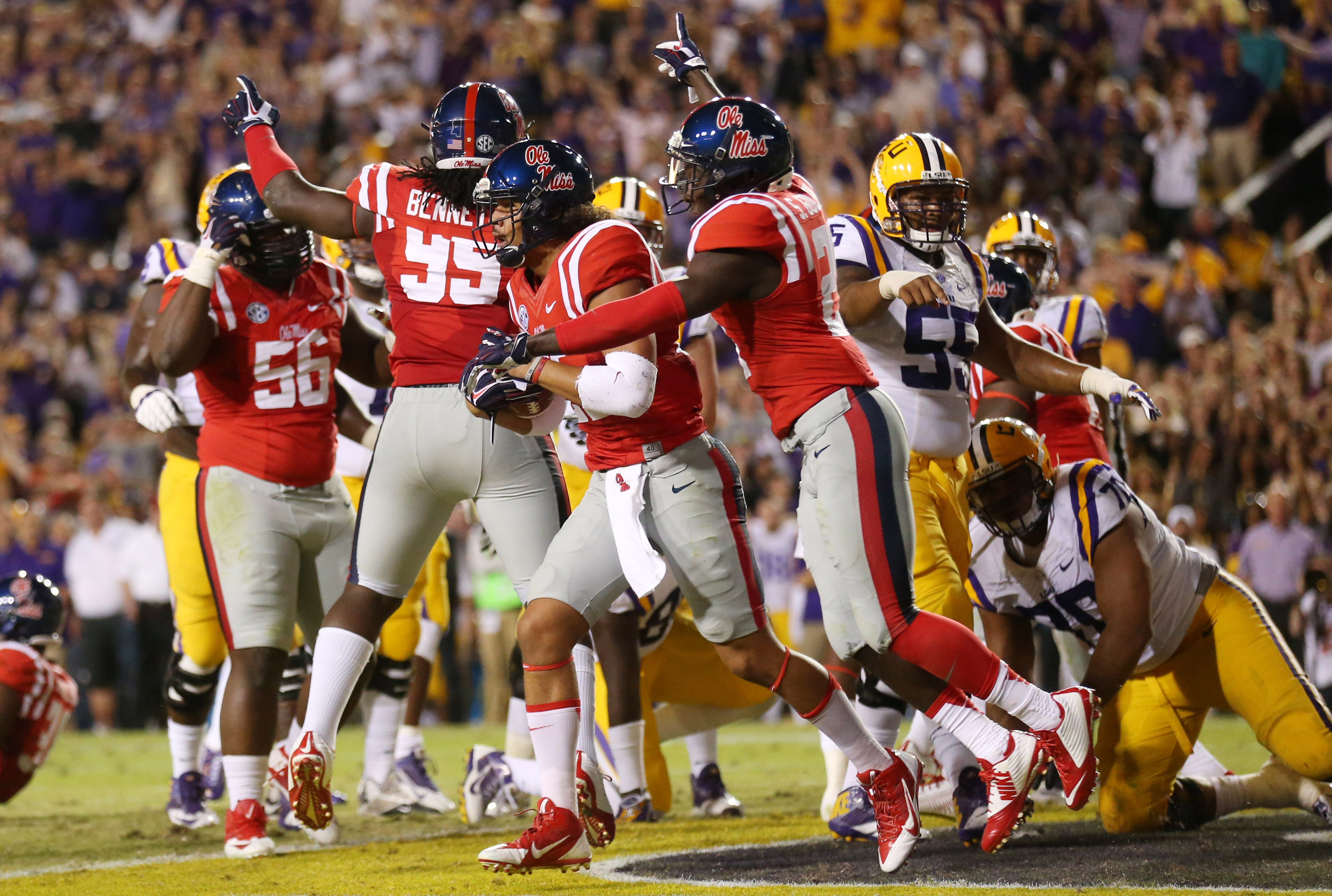Oct 25, 2014; Baton Rouge, LA, USA; Mississippi Rebels defensive back Cody Prewitt (25) is congratulated by teammate Senquez Golson (21) after recovering a fumble by the LSU Tigers in the first quarter at Tiger Stadium. (Crystal LoGiudice-USA TODAY Sports)