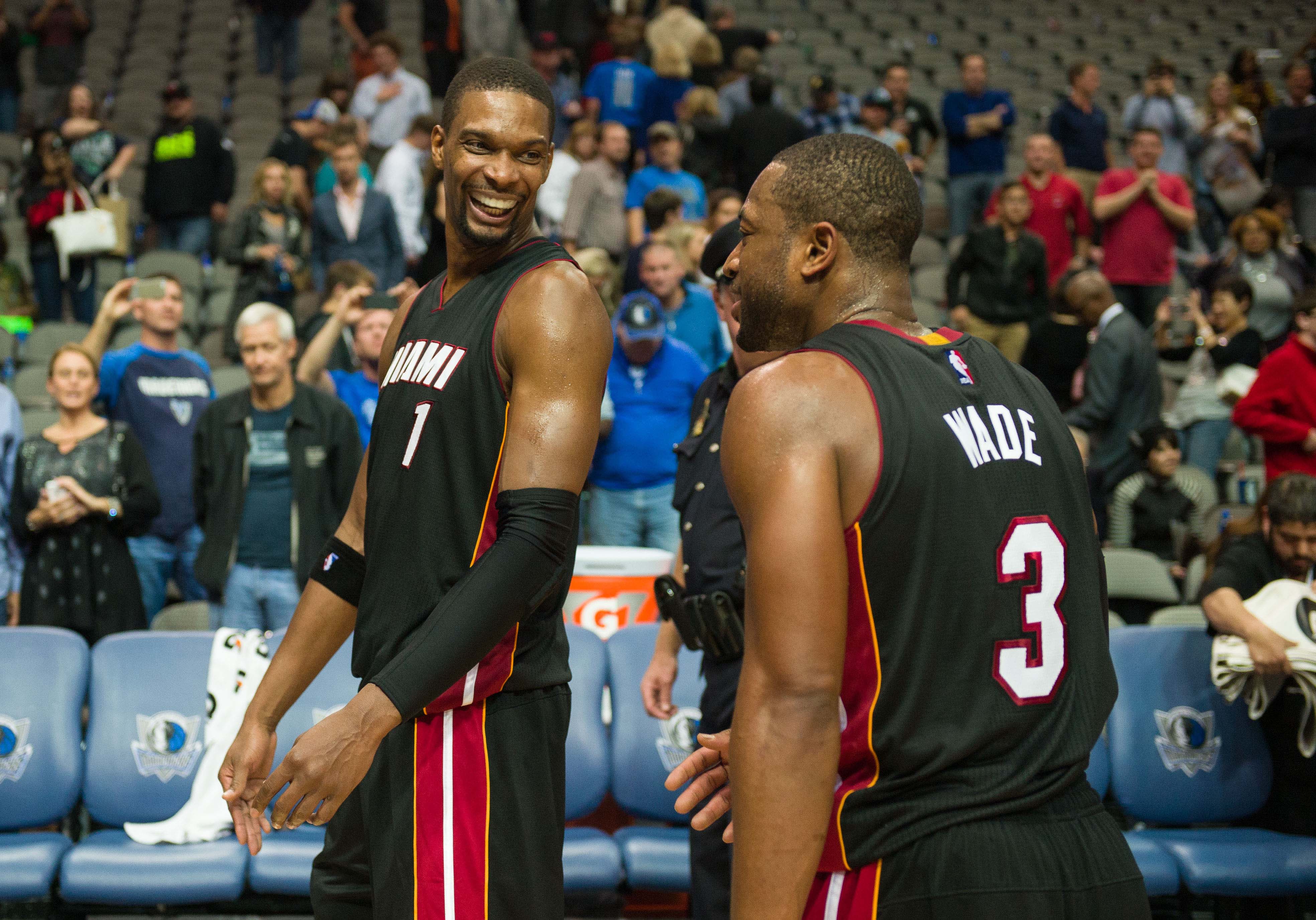 Chris Bosh (left) and Dwyane Wade have plenty of reason to be happy. (Jerome Miron-USA TODAY Sports)