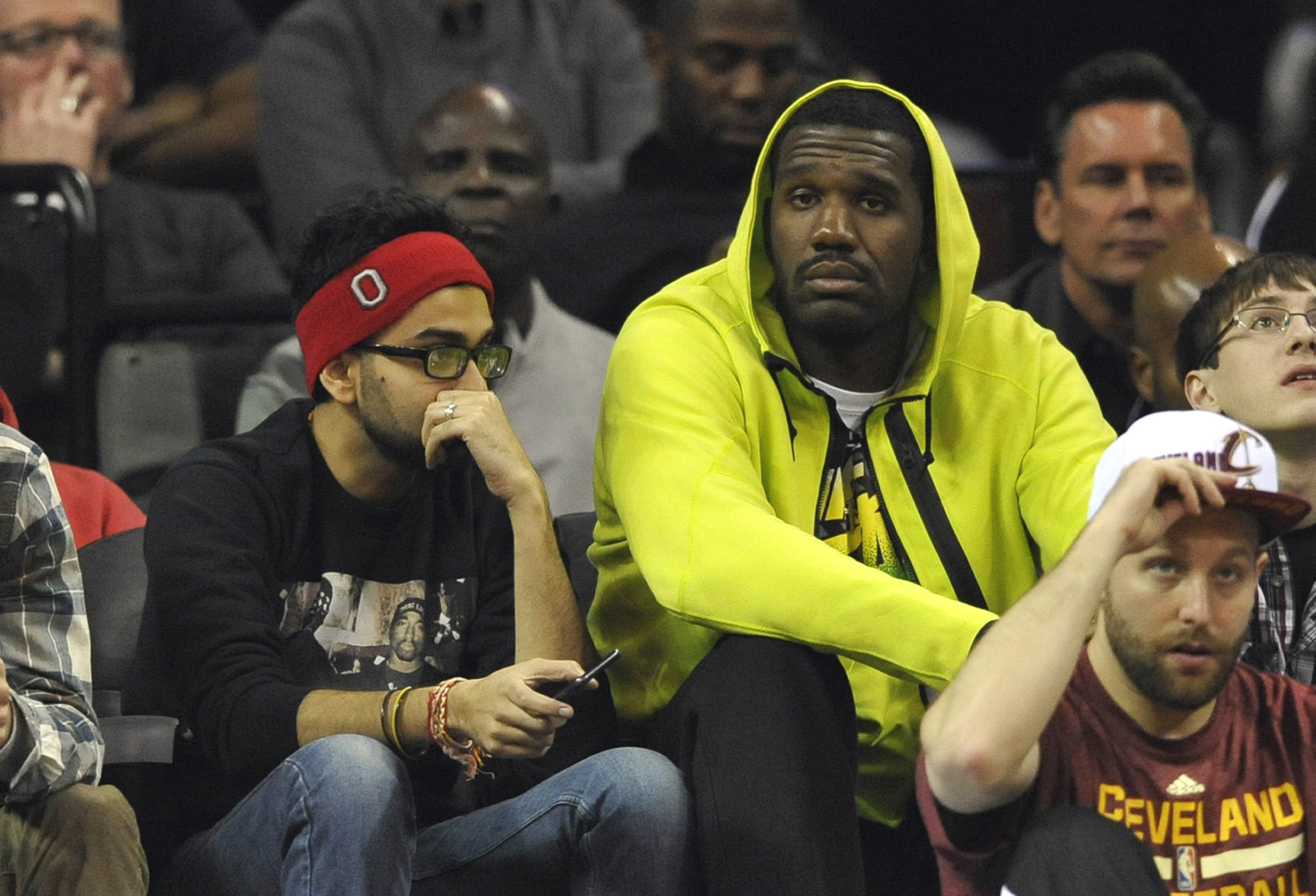 Greg Oden sits near the Cleveland Cavaliers bench  during a Nov. 22, 2014, game. (David Richard-USA TODAY Sports )
