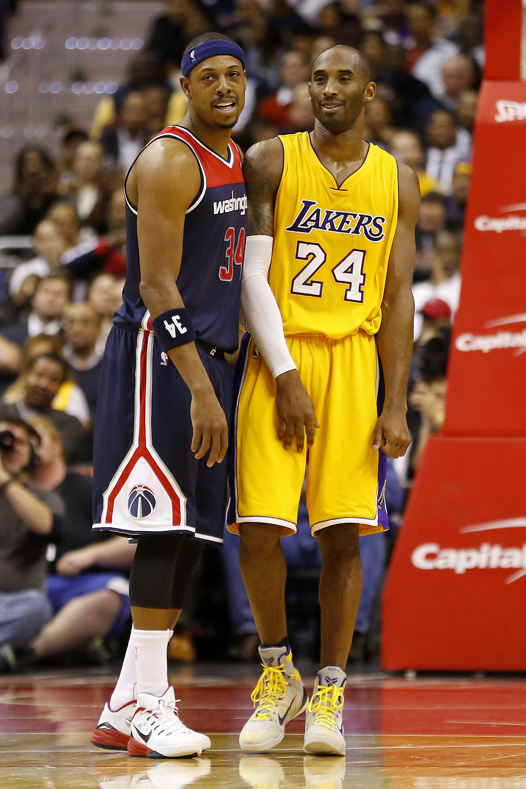 Paul and Kobe feel a draft. (Geoff Burke-USA TODAY Sports)