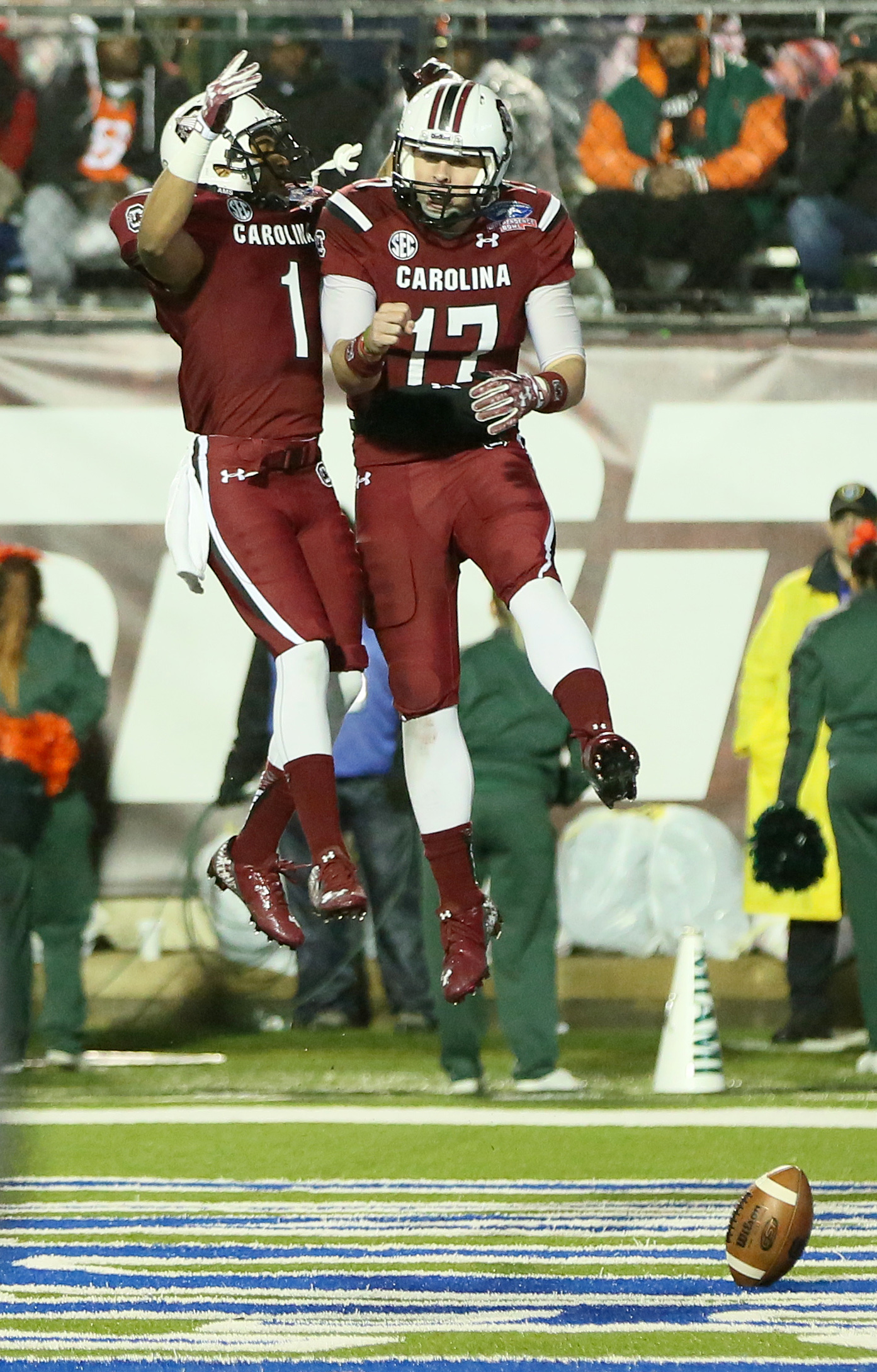 Dec 27, 2014; Shreveport, LA, USA; South Carolina Gamecocks quarterback Dylan Thompson (17) celebrates with wide receiver Damiere Byrd (1) after scoring a touchdown during the fourth quarter against the Miami Hurricanes in the 2014 Independence Bowl at Independence Stadium. South Carolina defeated Miami 24-21. (Nelson Chenault-USA TODAY Sports)