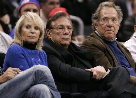 Los Angeles Clippers owner Donald Sterling (C), his wife Shelly (L) and actor George Segal attend the NBA basketball game between the Toronto Raptors and the Los Angeles Clippers at the Staples Center in Los Angeles, December 22, 2008. REUTERS/Danny Moloshok