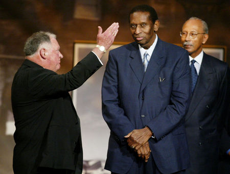 Earl Lloyd (center) was inducted into the Naismith Memorial Basketball Hall of Fame in 2003. (REUTERS/Jim Bourg)