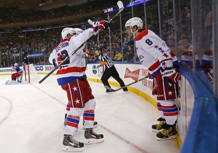 May 2, 2015; New York, NY, USA; Washington Capitals left wing Alex Ovechkin (8) celebrates with teammates after scoring a goal on New York Rangers goalie Henrik Lundqvist (30) during the third period in game two of the second round of the 2015 Stanley Cup Playoffs at Madison Square Garden. Adam Hunger-USA TODAY Sports