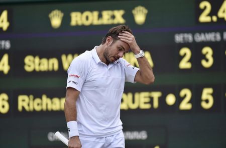 Stan Wawrinka reacts during his match against Richard Gasquet of France. (REUTERS)