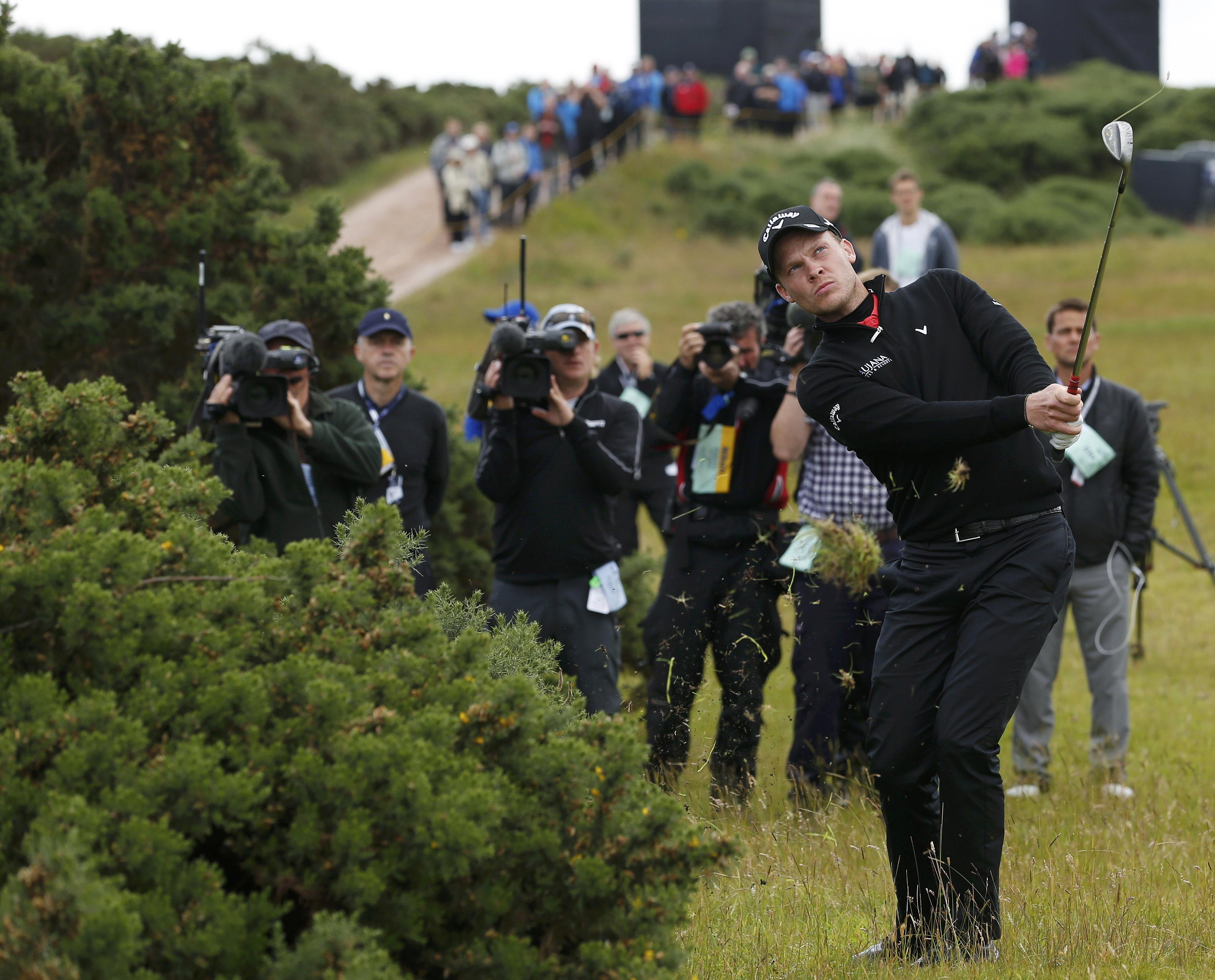 Danny Willett hits onto the sixth green during the second round of the British Open. (REUTERS)