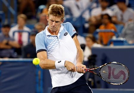 Cincinnati, OH, USA; Kevin Anderson (RSA) returns a shot against Roger Federer (not pictured) on day six during the Western and Southern Open tennis tournament at Linder Family Tennis Center on Aug 20, 2015.  Aaron Doster-USA TODAY Sports