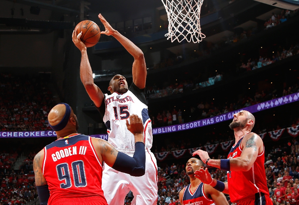 Can the Wizards' bigs find a way to deal with Al Horford and Paul Millsap? (AFP/Kevin C. Cox)