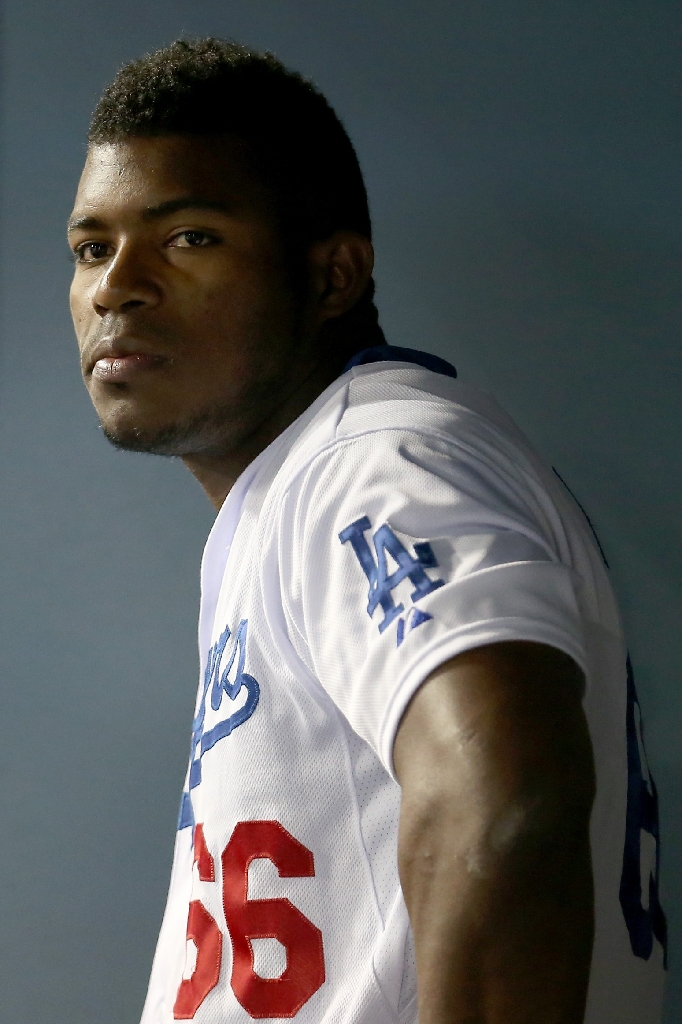 Yasiel Puig (AFP Photo/Stephen Dunn)