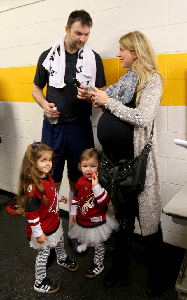 John Scott of the Arizona Coyotes talks to his wife Danielle Scott after the NHL All-Star Game between the Eastern Conference and the Western Conference, at Bridgestone Arena in Nashville, Tennessee, on January 31, 2016 (AFP Photo/Bruce Bennett)