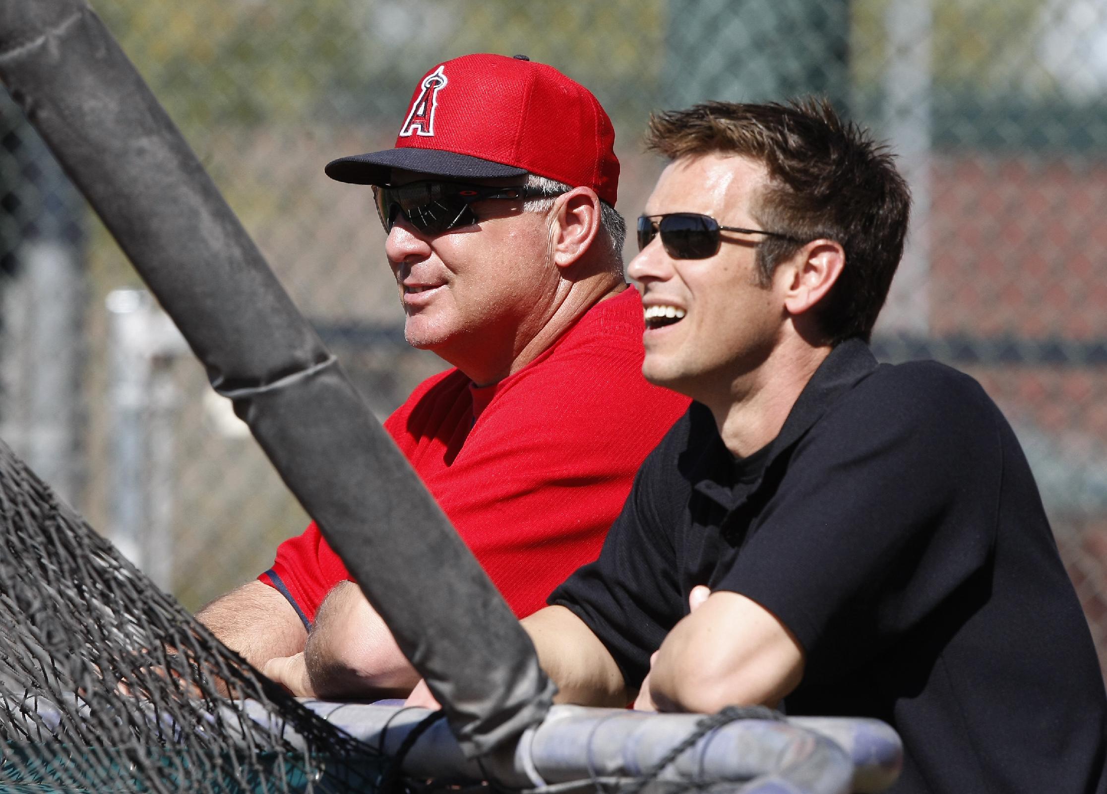 Mike Scioscia and Jerry Dipoto (AP Photo/Rick Scuteri)