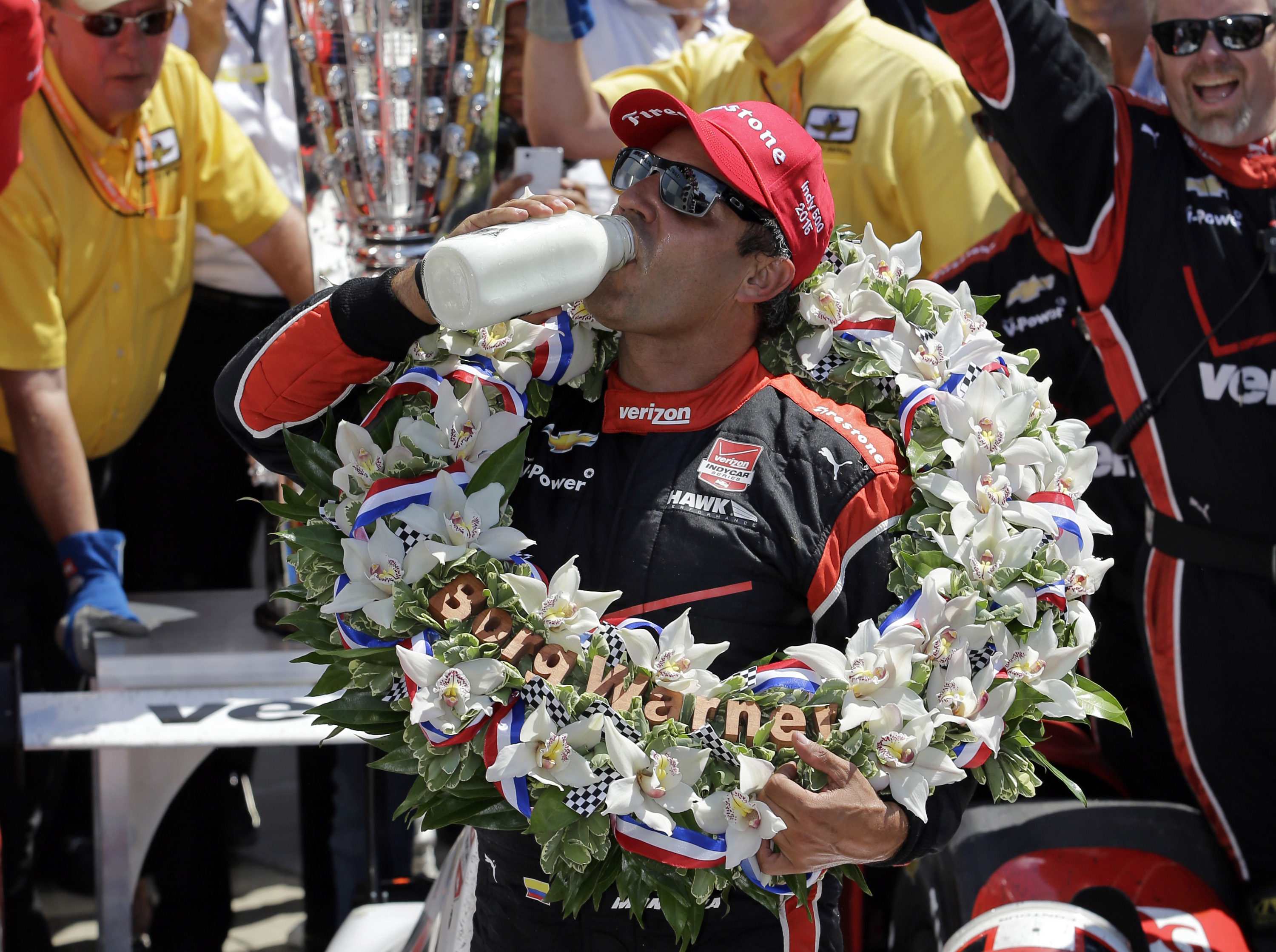 Juan Pablo Montoya celebrates after winning the 99th running of the Indianapolis 500. (AP)