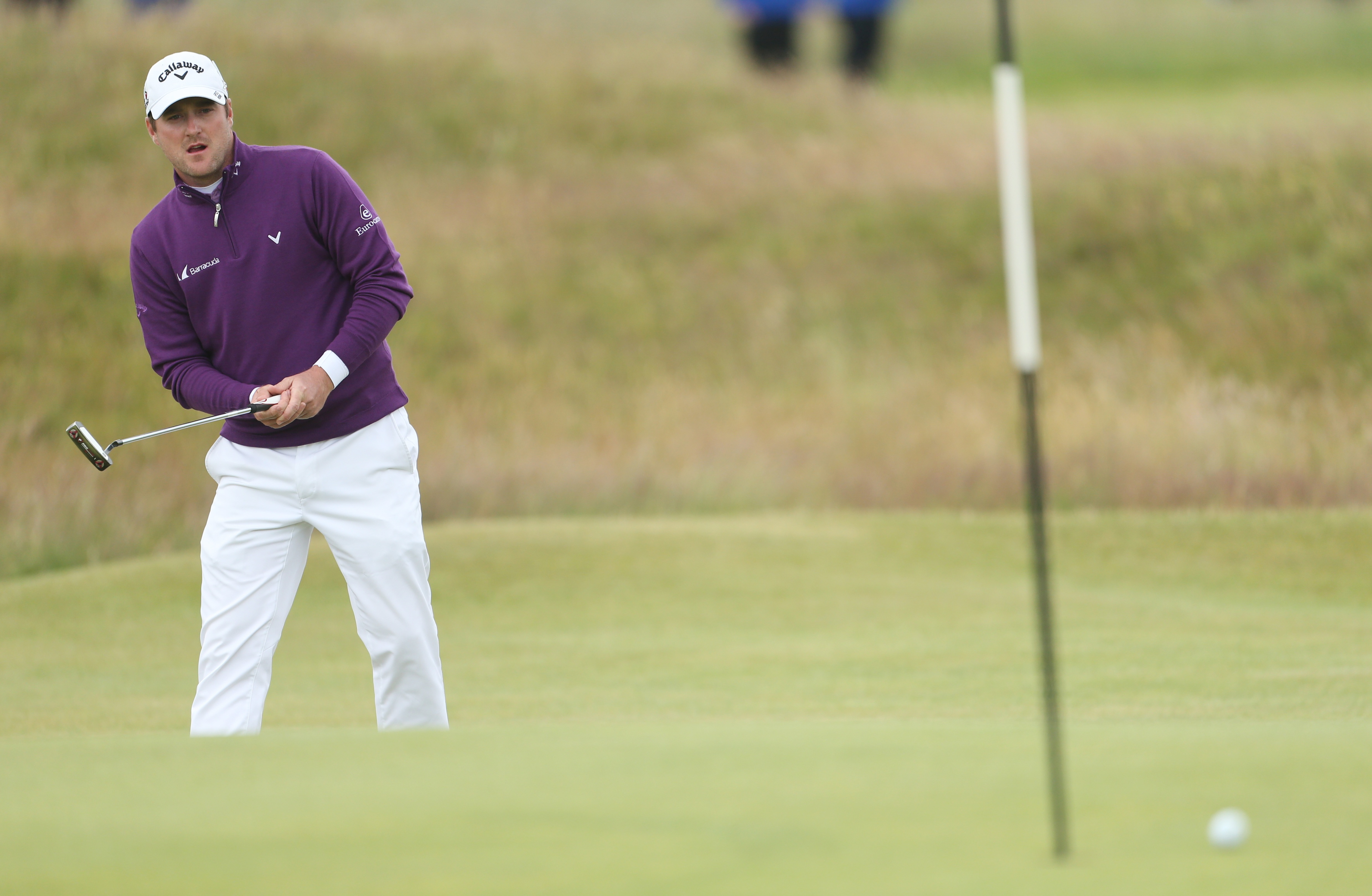 Scotland’s Marc Warren putts on the 17th green. (AP)