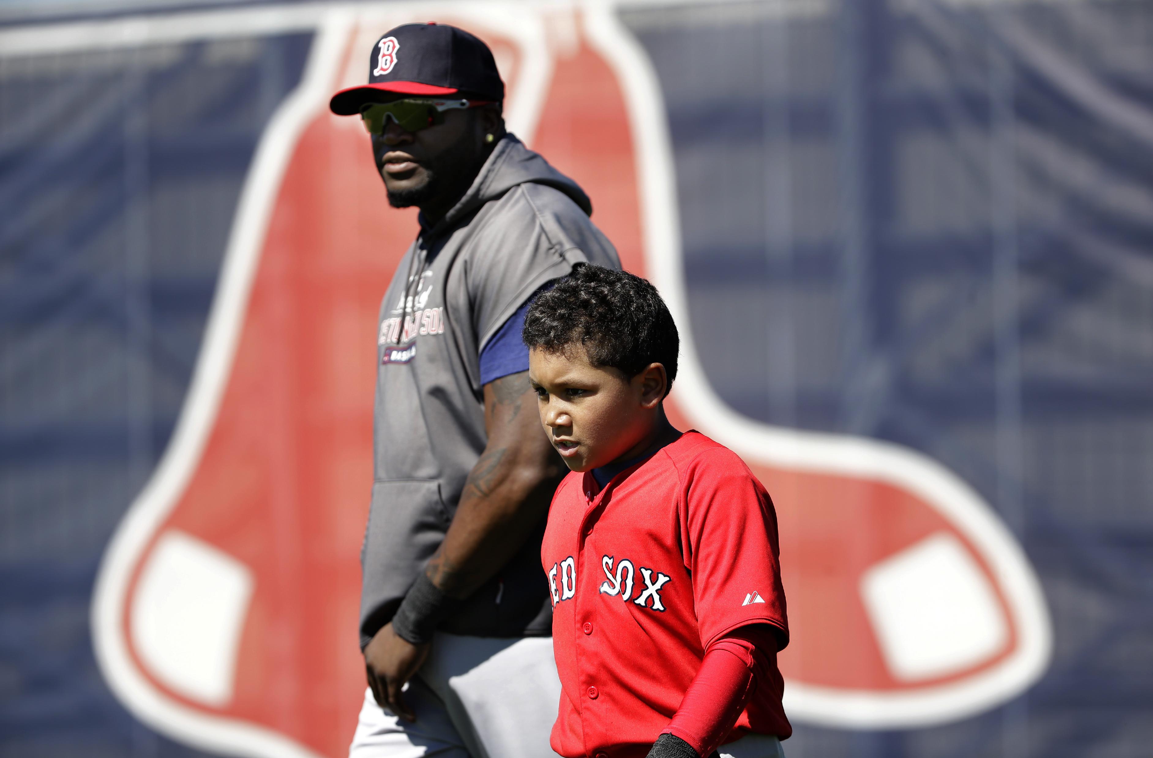 Like father, like son. (AP Photo/Steven Senne)