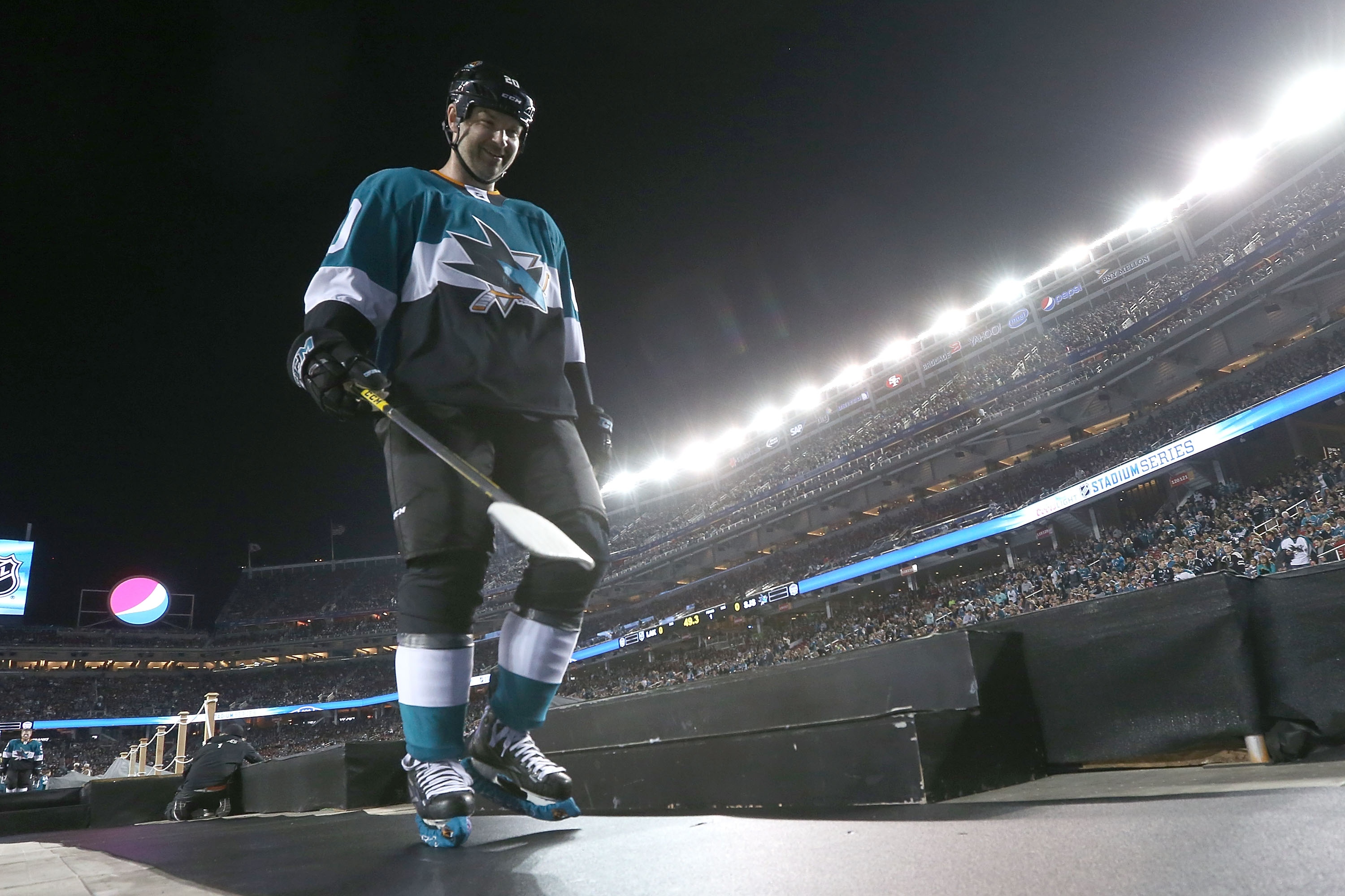 SANTA CLARA, CA - FEBRUARY 21:  John Scott #20 of the San Jose Sharks walks back to the locker room after warm ups against the Los Angeles Kings at Levi's Stadium on February 21, 2015 in Santa Clara, California.  (Photo by Bruce Bennett/Getty Images)