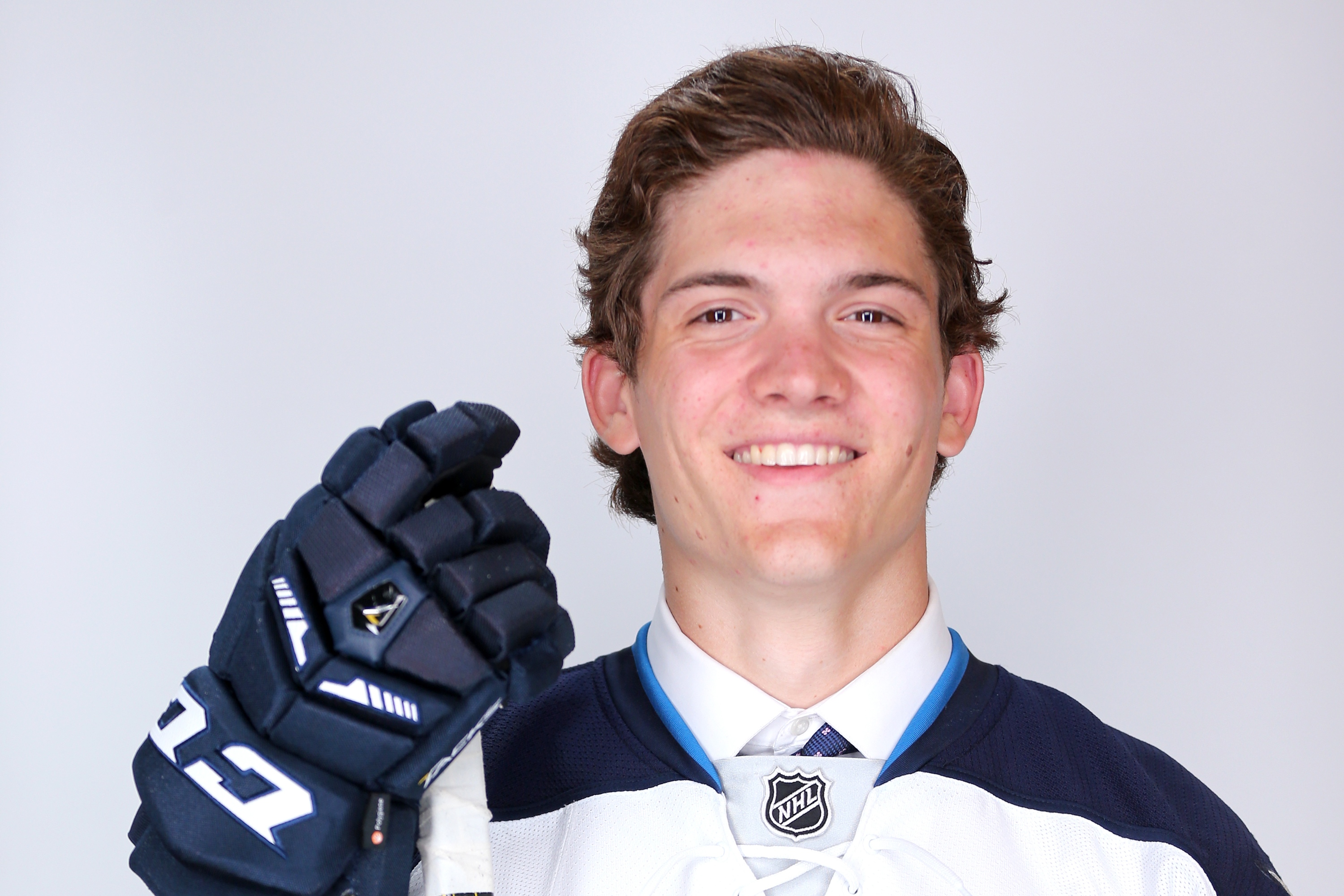 SUNRISE, FL - JUNE 26:  Jack Roslovic poses for a portrait after being selected 25th overall by the Winnipeg Jets during the 2015 NHL Draft at BB&T Center on June 26, 2015 in Sunrise, Florida.  (Photo by Mike Ehrmann/Getty Images)