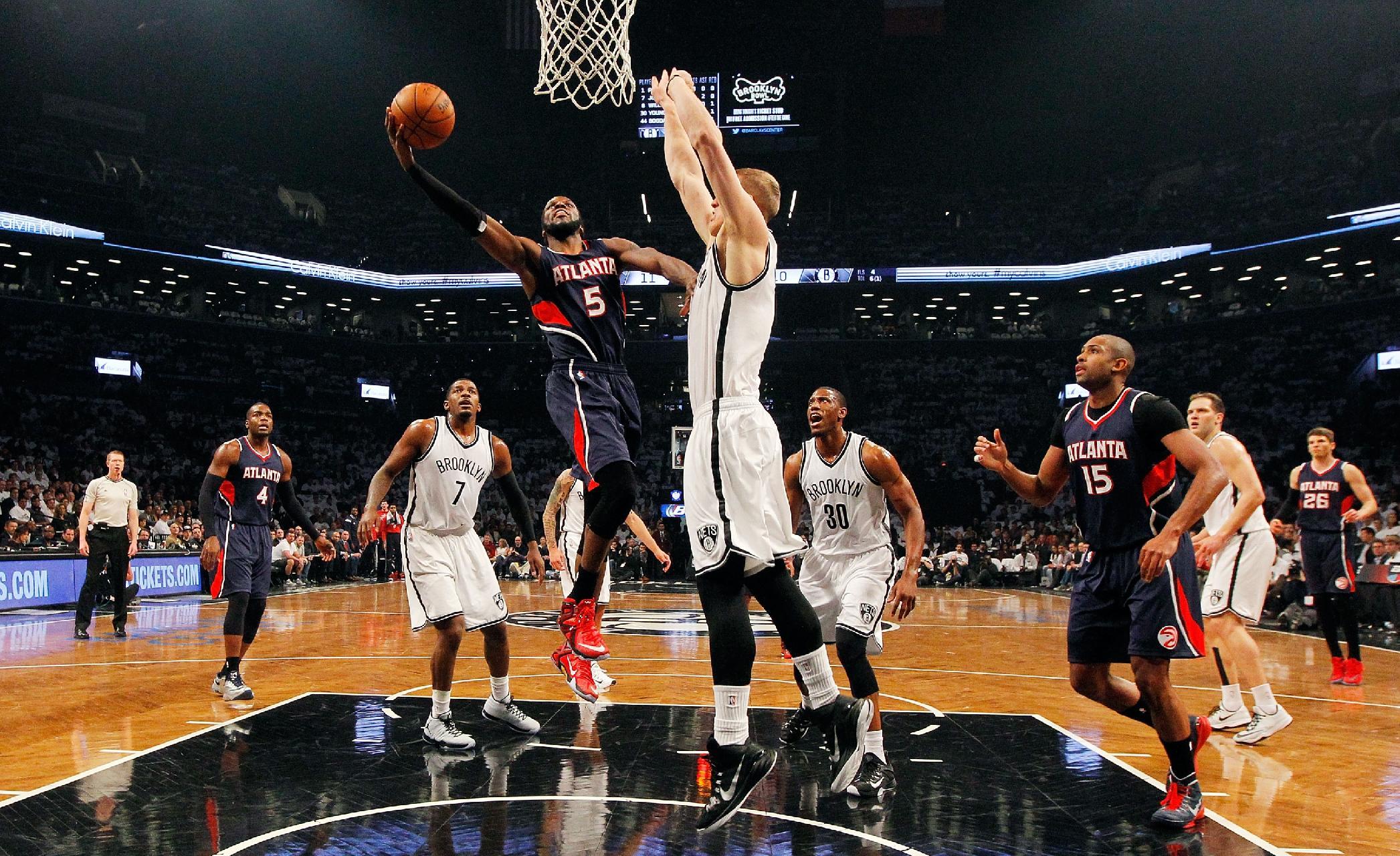 DeMarre Carroll's been an unsung hero among the Hawks' starters all year. (Jim McIsaac/Getty Images)