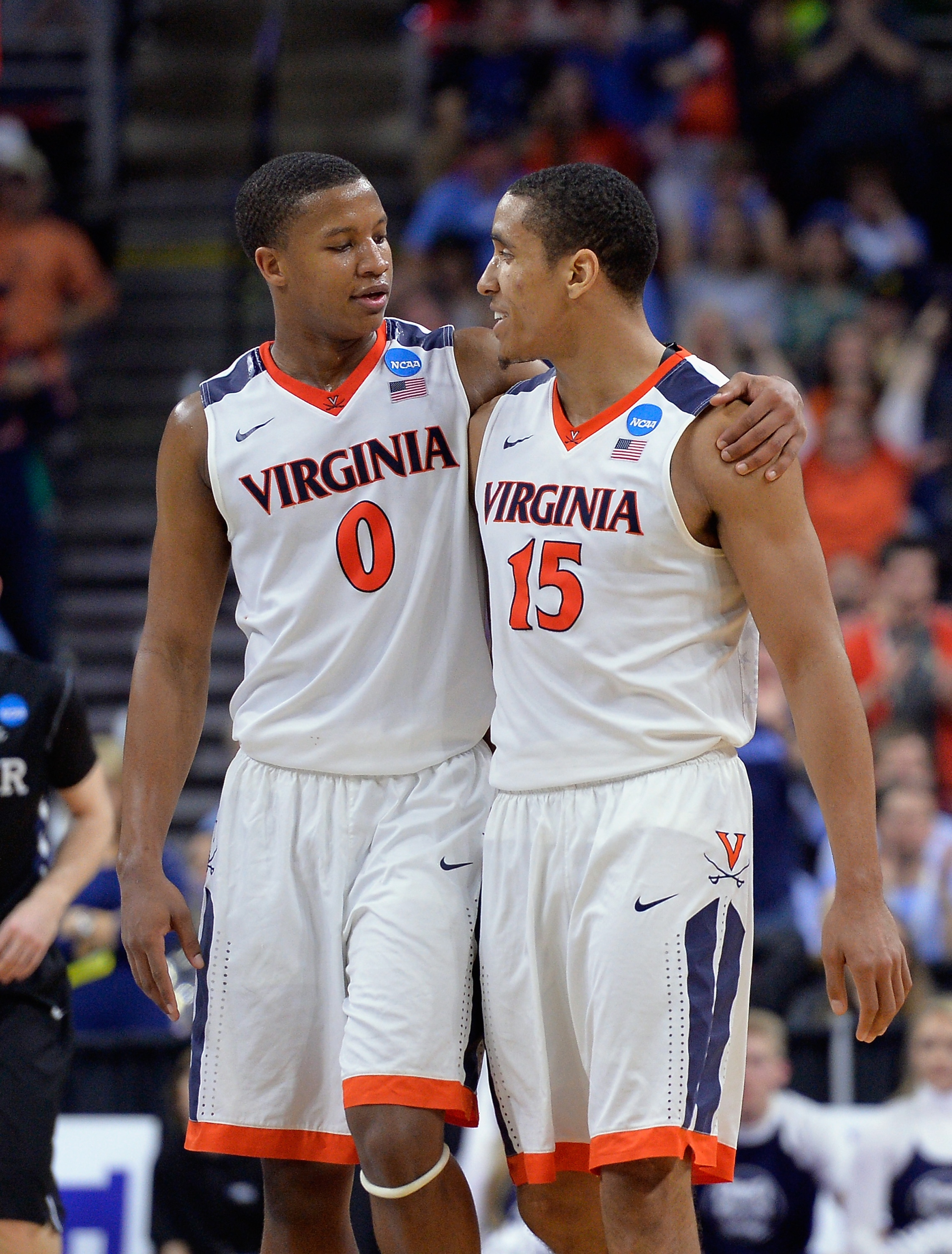 Virginia's Devon Hall and Malcolm Brogdon (Photo by Grant Halverson/Getty Images)