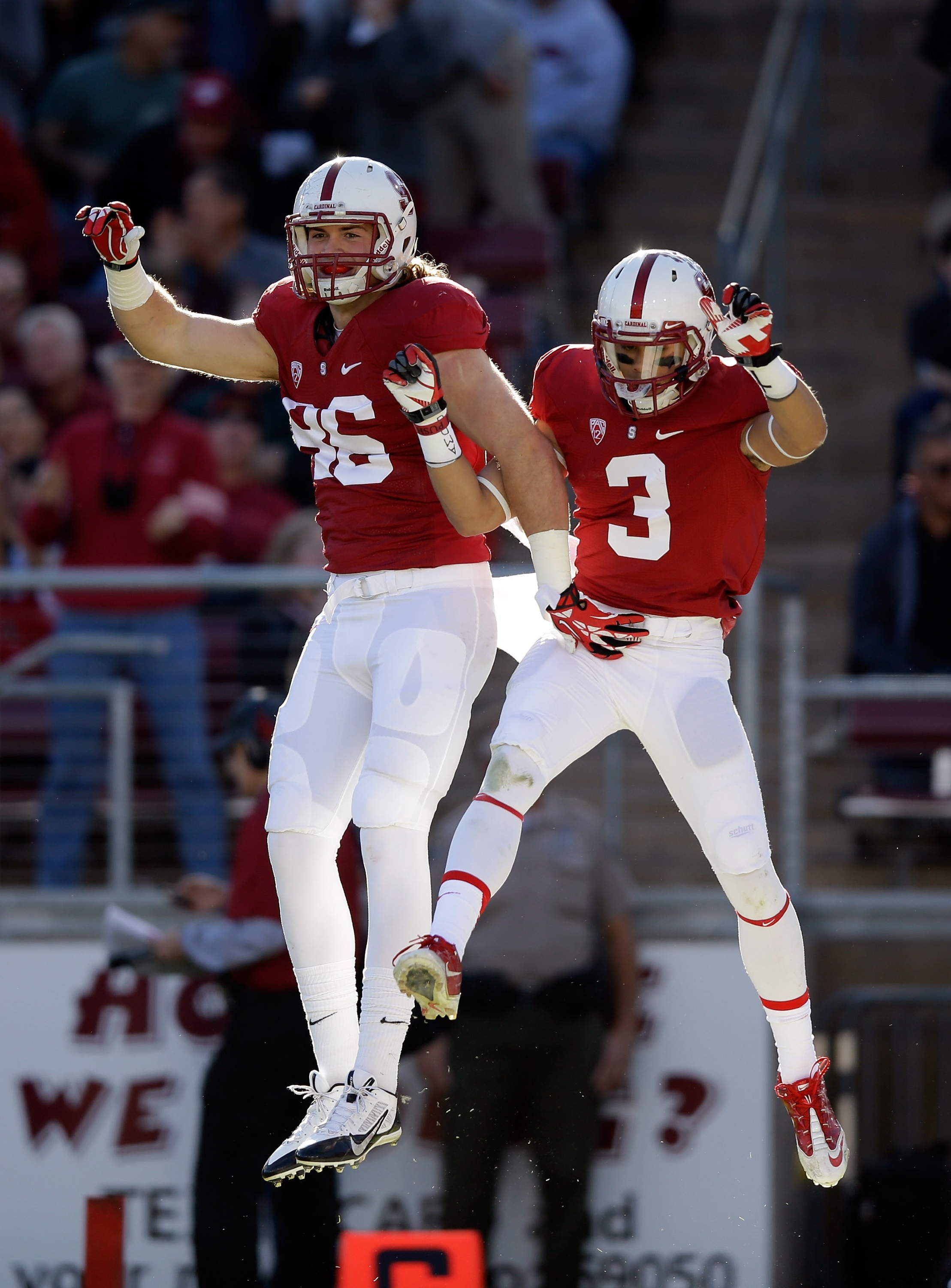 PALO ALTO, CA - NOVEMBER 23: Charlie Hopkins #86 congratulates Michael Rector #3 of the Stanford Cardinal after he scored a touchdown against the California Golden Bears at Stanford Stadium on November 23, 2013 in Palo Alto, California. (Photo by Ezra Shaw/Getty Images)