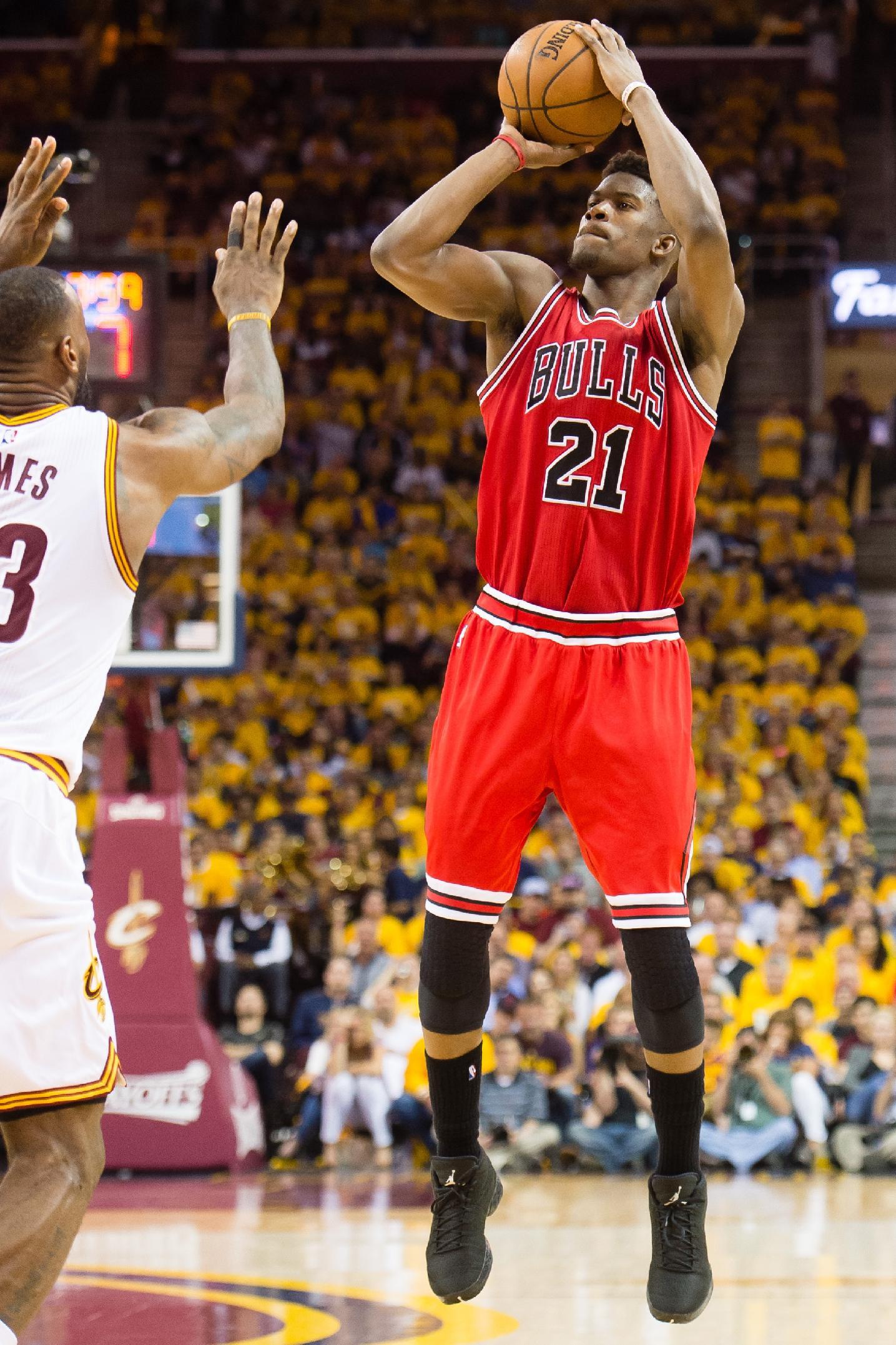 CLEVELAND, OH - MAY 4: Jimmy Butler #21 of the Chicago Bulls shoots over LeBron James #23 of the Cleveland Cavaliers in the second half during Game One in the Eastern Conference Semifinals of the 2015 NBA Playoffs 2015 at Quicken Loans Arena on May 4, 2015 in Cleveland, Ohio. The Bulls defeated the Cavaliers 99-92. NOTE TO USER: User expressly acknowledges and agrees that, by downloading and or using this photograph, User is consenting to the terms and conditions of the Getty Images License Agreement. (Photo by Jason Miller/Getty Images)