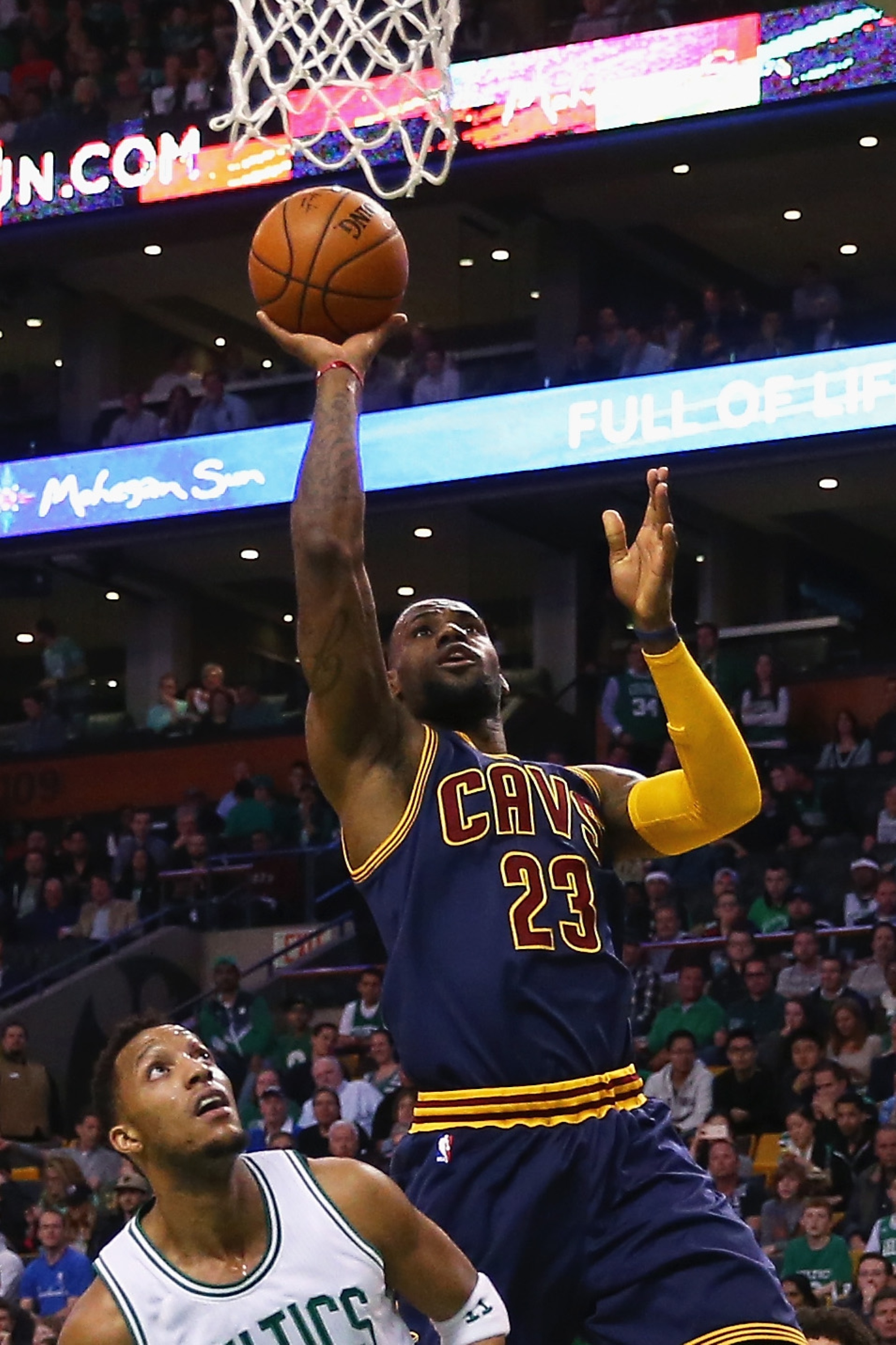 BOSTON, MA - APRIL 23:  LeBron James #23 of the Cleveland Cavaliers takes a shot over Evan Turner #11 of the Boston Celtics during the first quarter of their game in the first round of the 2015 NBA Playoffs at TD Garden on April 23, 2015 in Boston, Massachusetts. NOTE TO USER: User expressly acknowledges and agrees that, by downloading and/or using this photograph, user is consenting to the terms and conditions of the Getty Images License Agreement.  (Photo by Maddie Meyer/Getty Images)